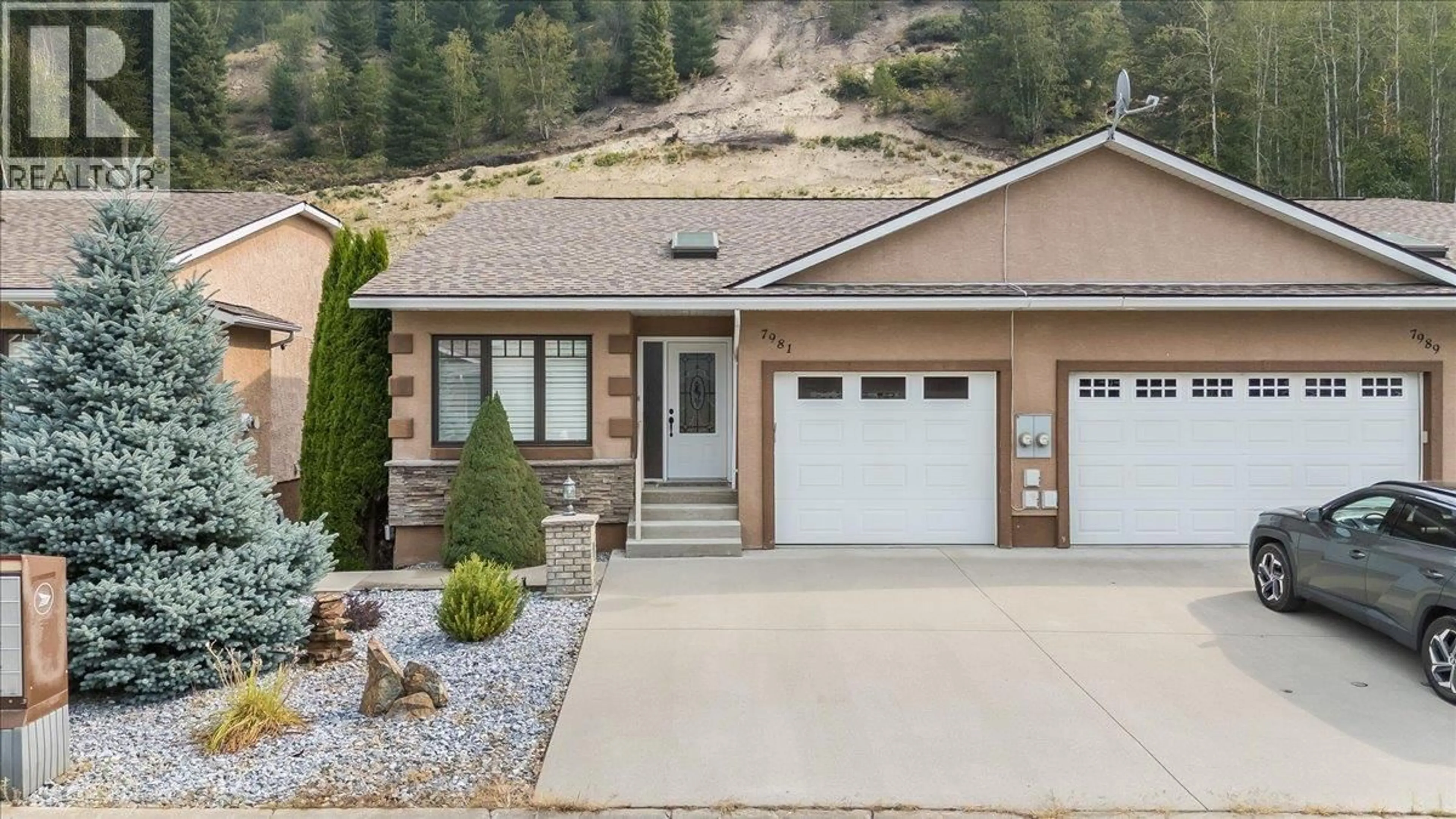 Home with vinyl exterior material, mountain view for 7981 BIRCHWOOD DRIVE, Trail British Columbia V1R4Y3