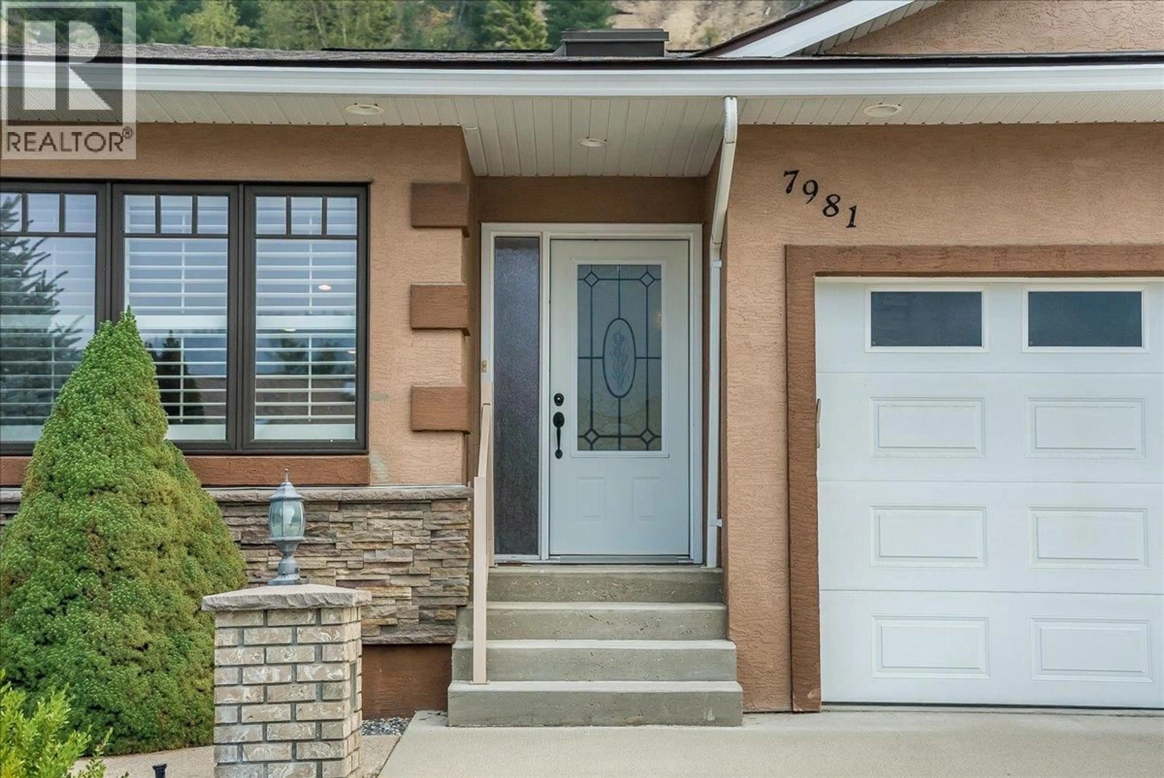 Home with brick exterior material, street for 7981 BIRCHWOOD DRIVE, Trail British Columbia V1R4Y3