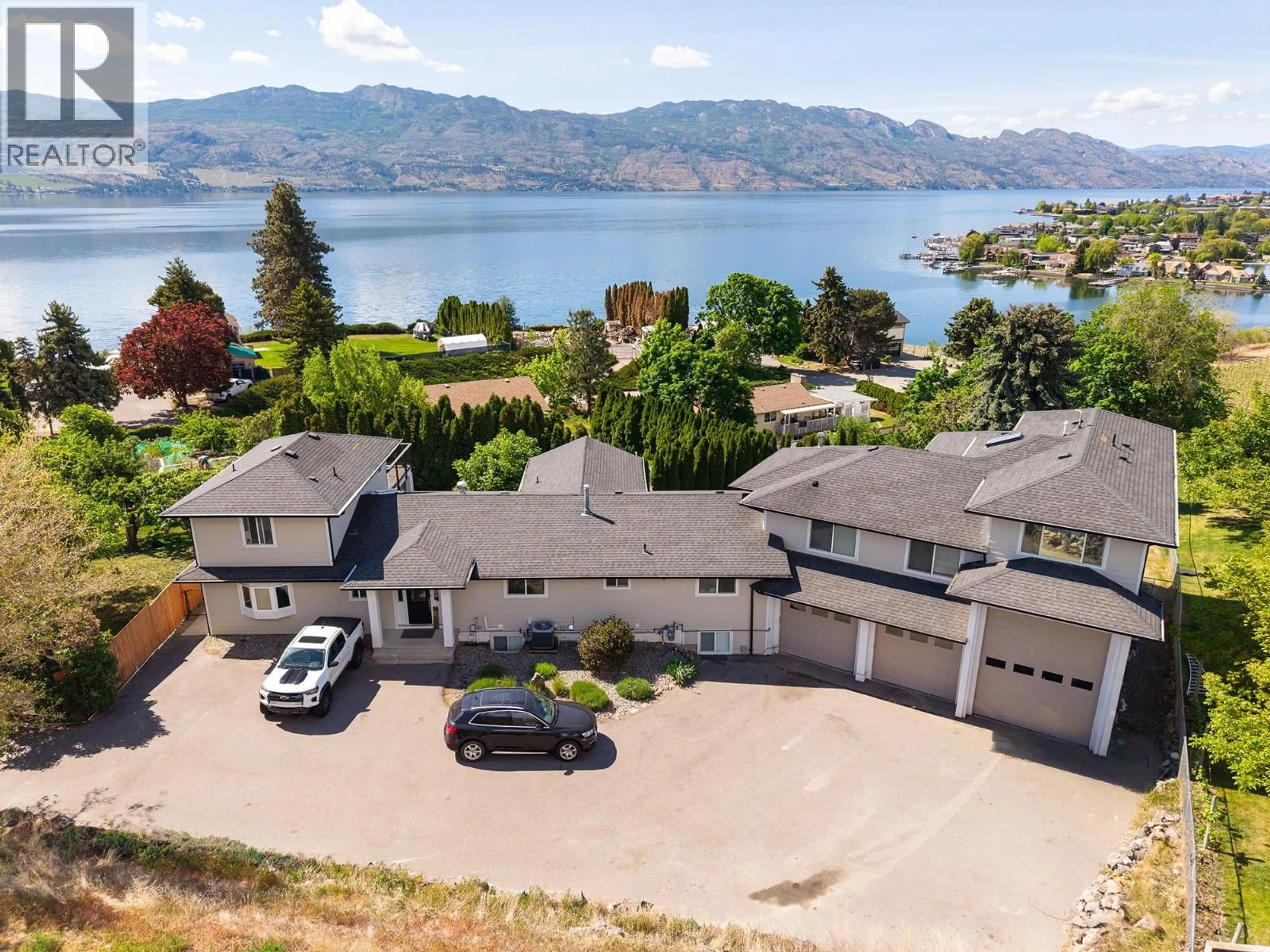 A pic from outside/outdoor area/front of a property/back of a property/a pic from drone, water/lake/river/ocean view for 1185 SUNNYSIDE ROAD, West Kelowna British Columbia V1Z2S5