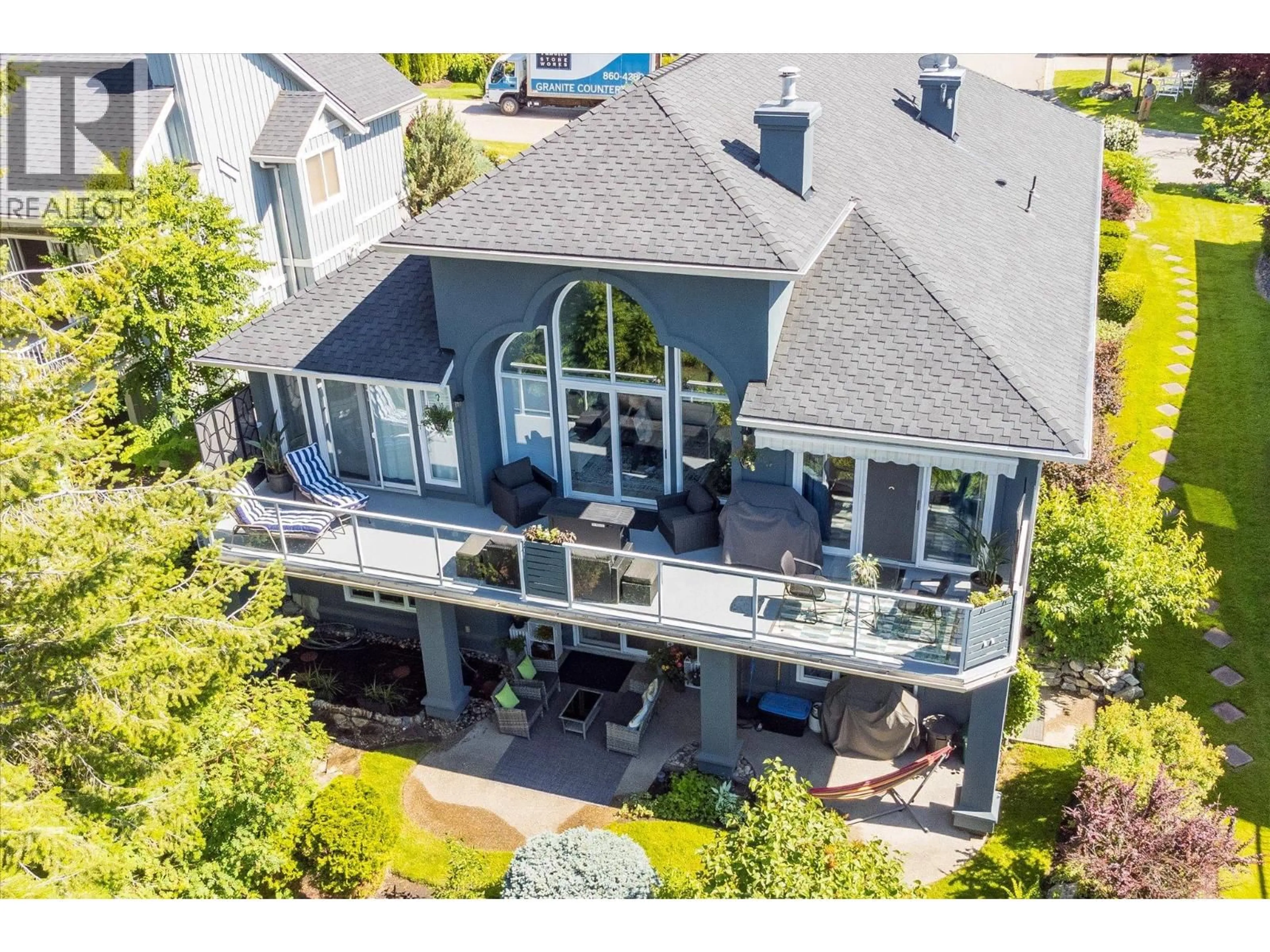 A pic from outside/outdoor area/front of a property/back of a property/a pic from drone, water/lake/river/ocean view for 4187 GALLAGHERS CRESCENT, Kelowna British Columbia V1W3Z9