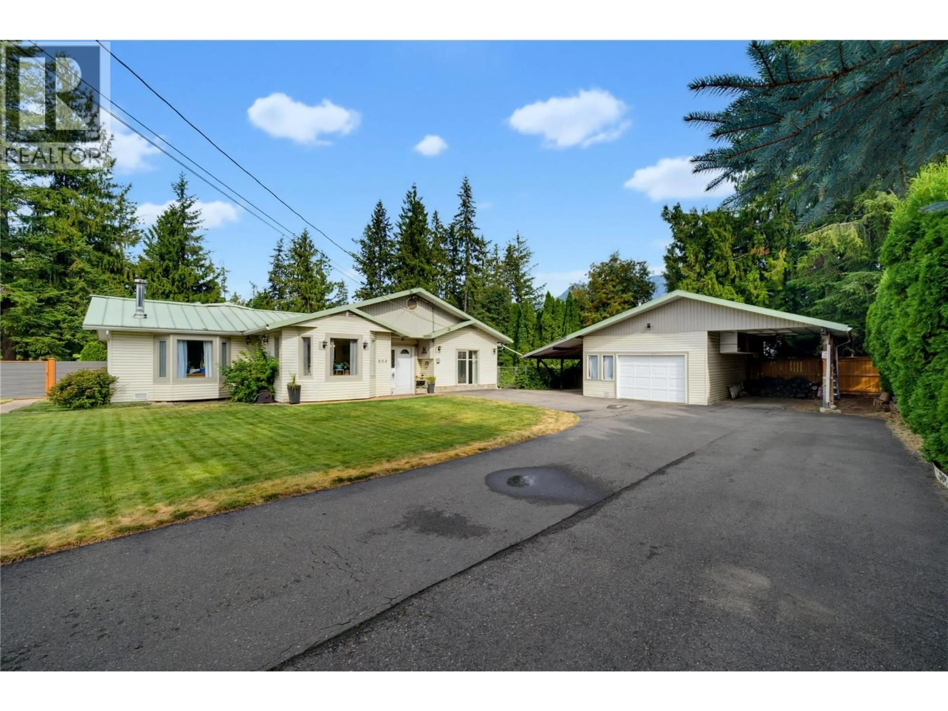 A pic from outside/outdoor area/front of a property/back of a property/a pic from drone, street for 502 MAPLE STREET, Sicamous British Columbia V0E2V0