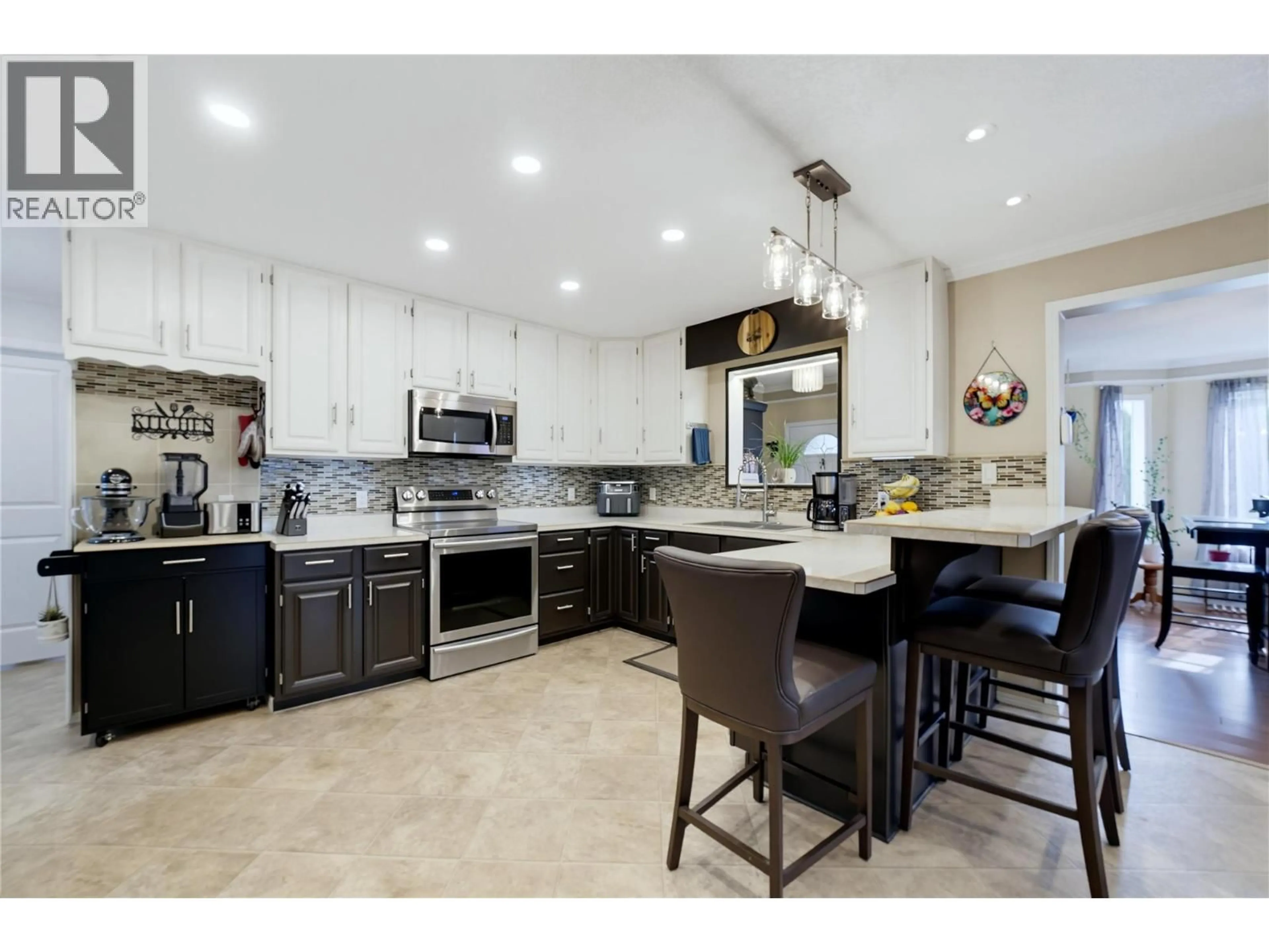 Open concept kitchen, ceramic/tile floor for 502 MAPLE STREET, Sicamous British Columbia V0E2V0