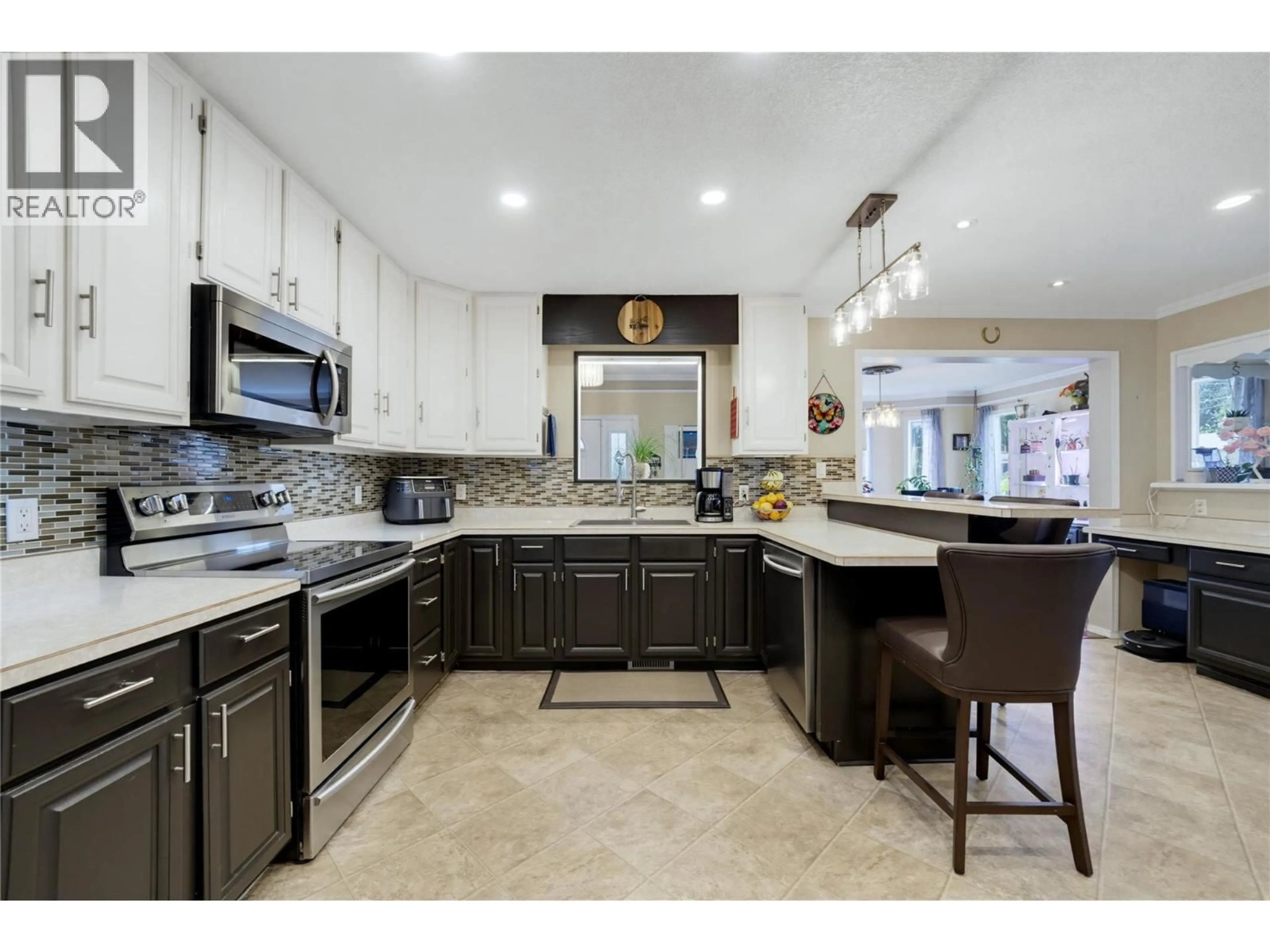Open concept kitchen, ceramic/tile floor for 502 MAPLE STREET, Sicamous British Columbia V0E2V0