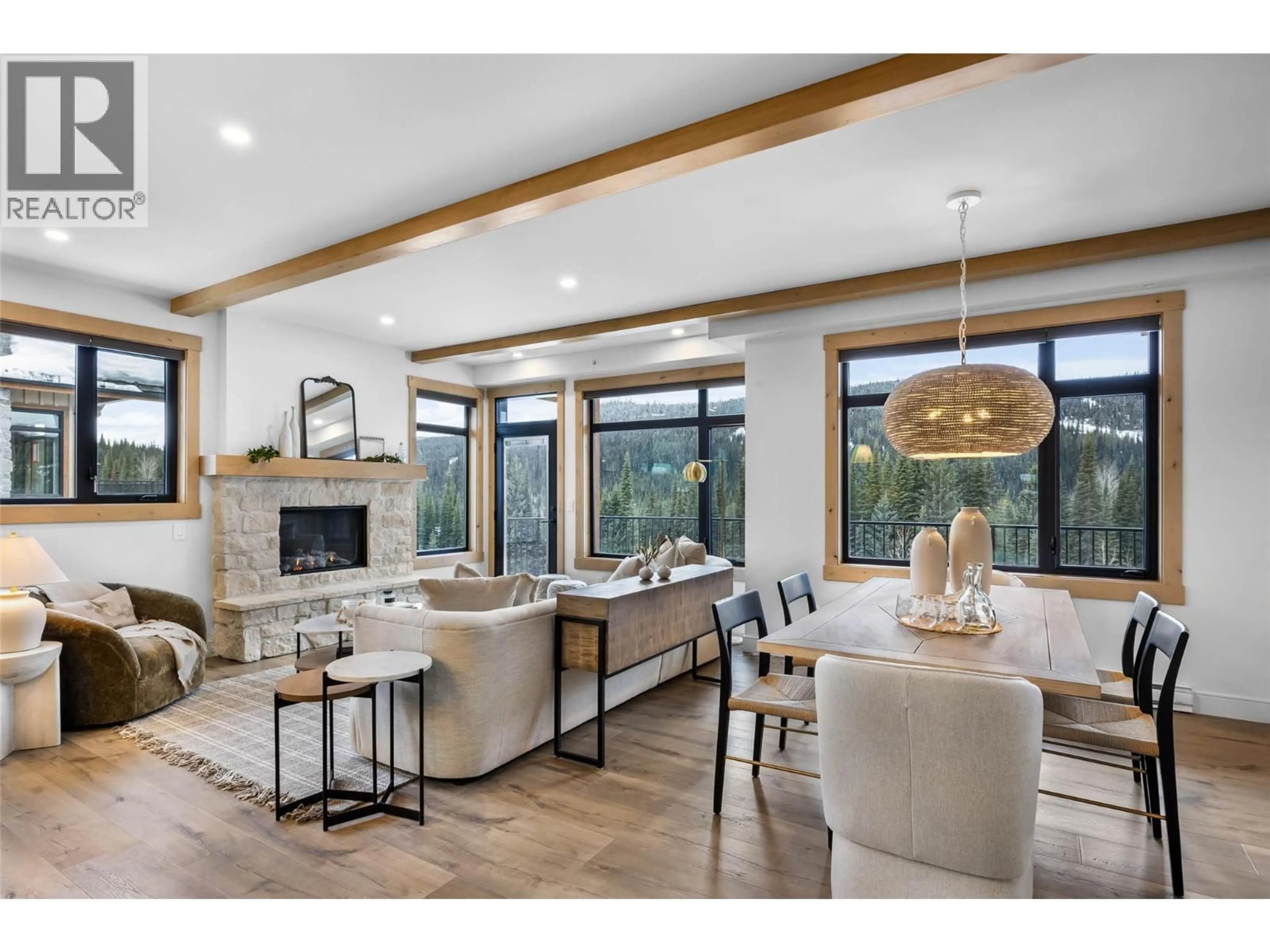 Living room with furniture, wood/laminate floor for 21 - 7005 MCGILLIVRAY LAKE DRIVE, Sun Peaks British Columbia V0E5N0