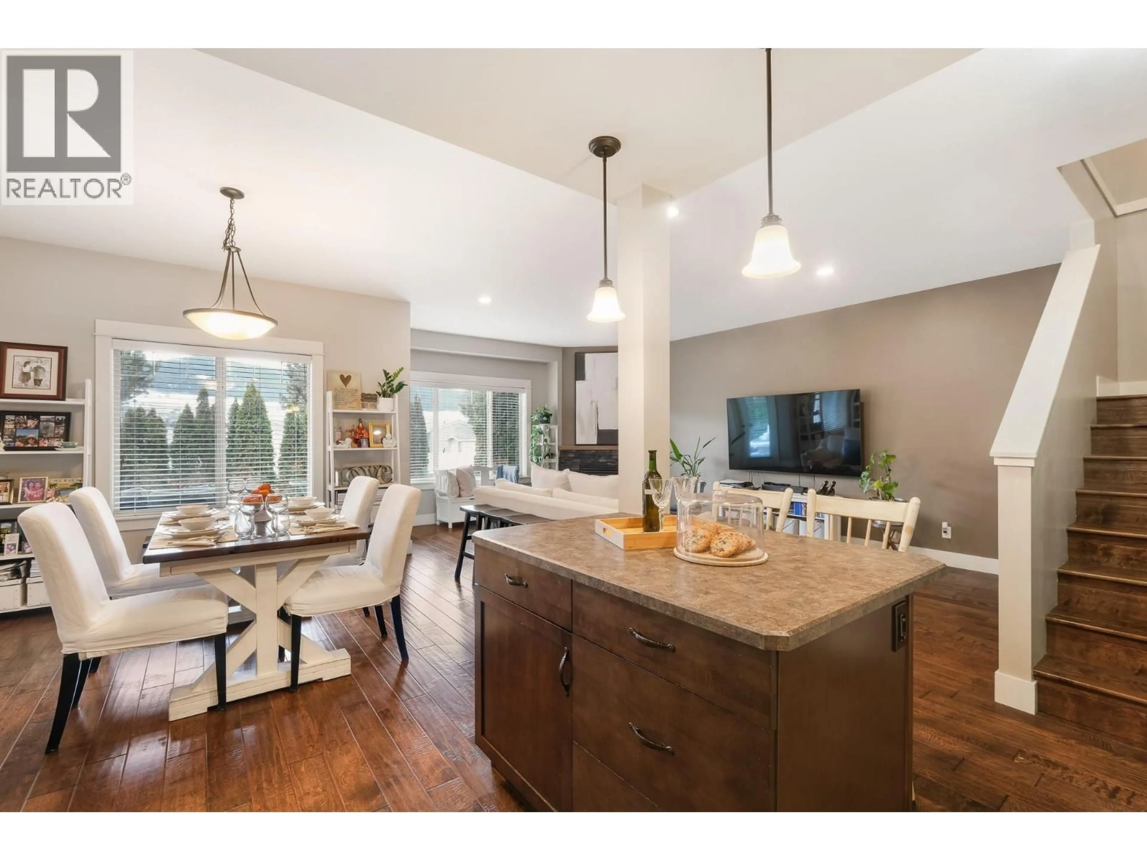 Open concept kitchen, wood/laminate floor for 8 - 6635 TRONSON ROAD, Vernon British Columbia V1H2K4