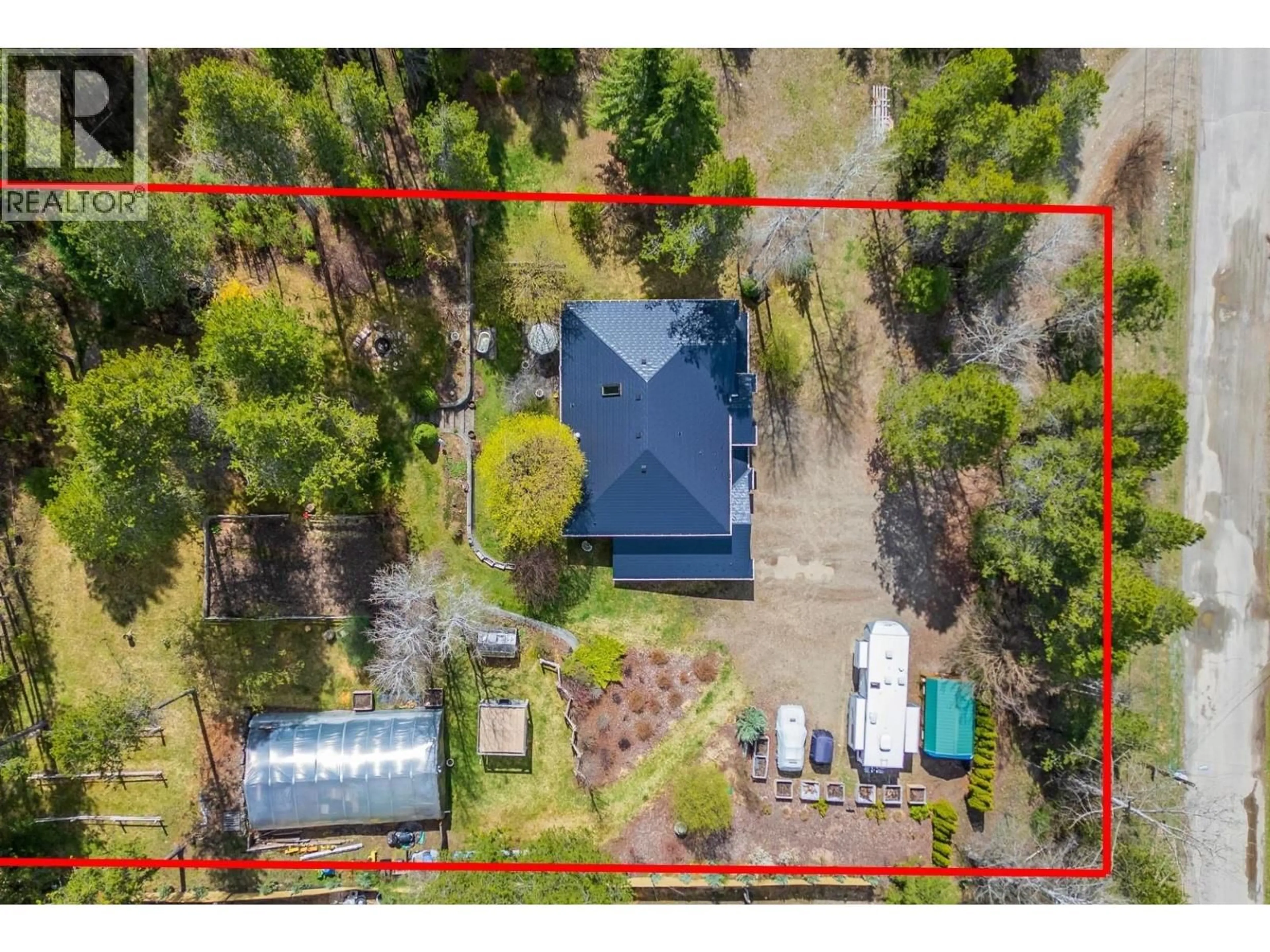 A pic from outside/outdoor area/front of a property/back of a property/a pic from drone, forest/trees view for 610 STRATHMORE AVENUE, Greenwood British Columbia V0H1J0