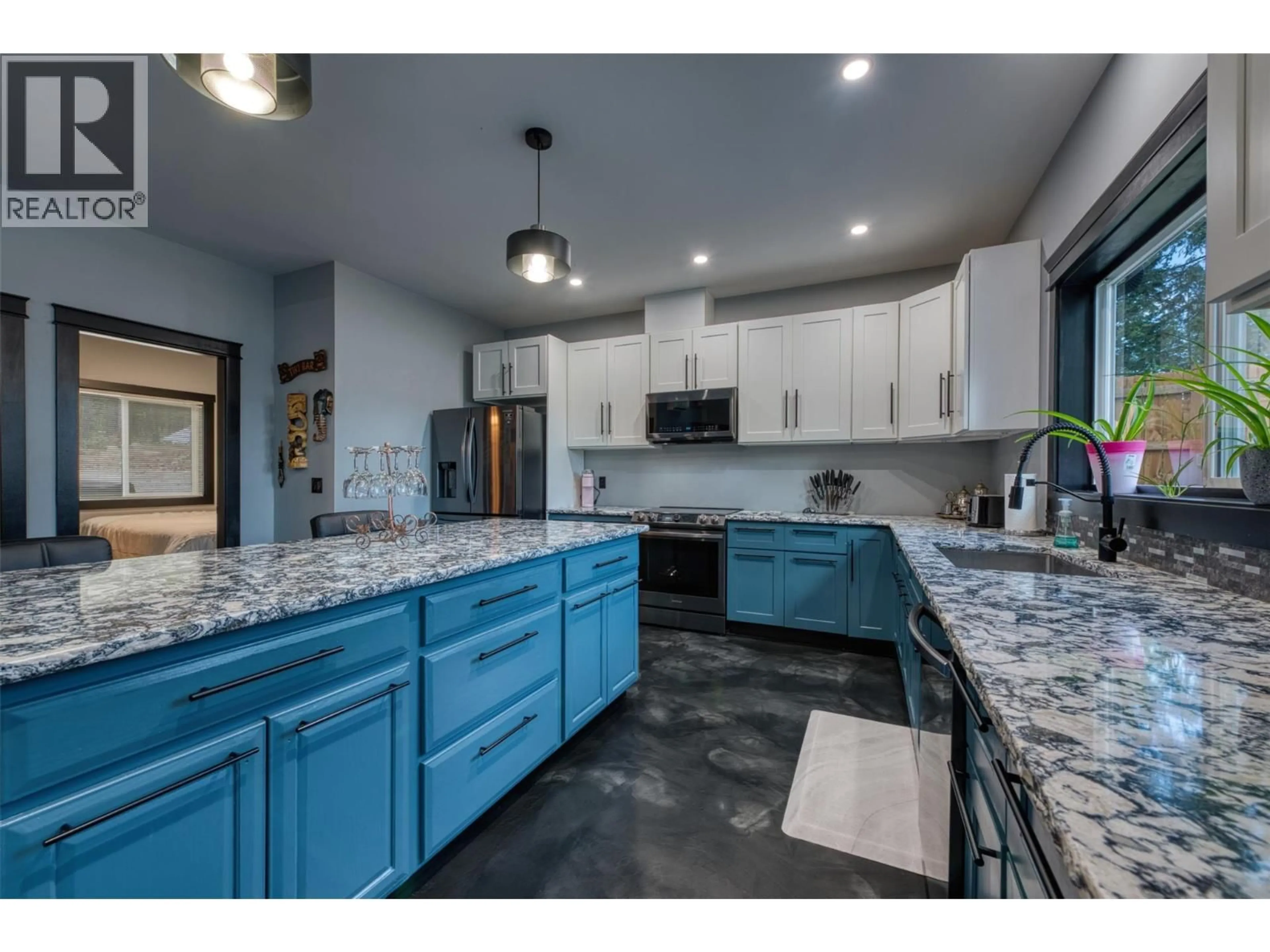 Open concept kitchen, ceramic/tile floor for 10795 WESTSHORE ROAD, Vernon British Columbia V1H2C3