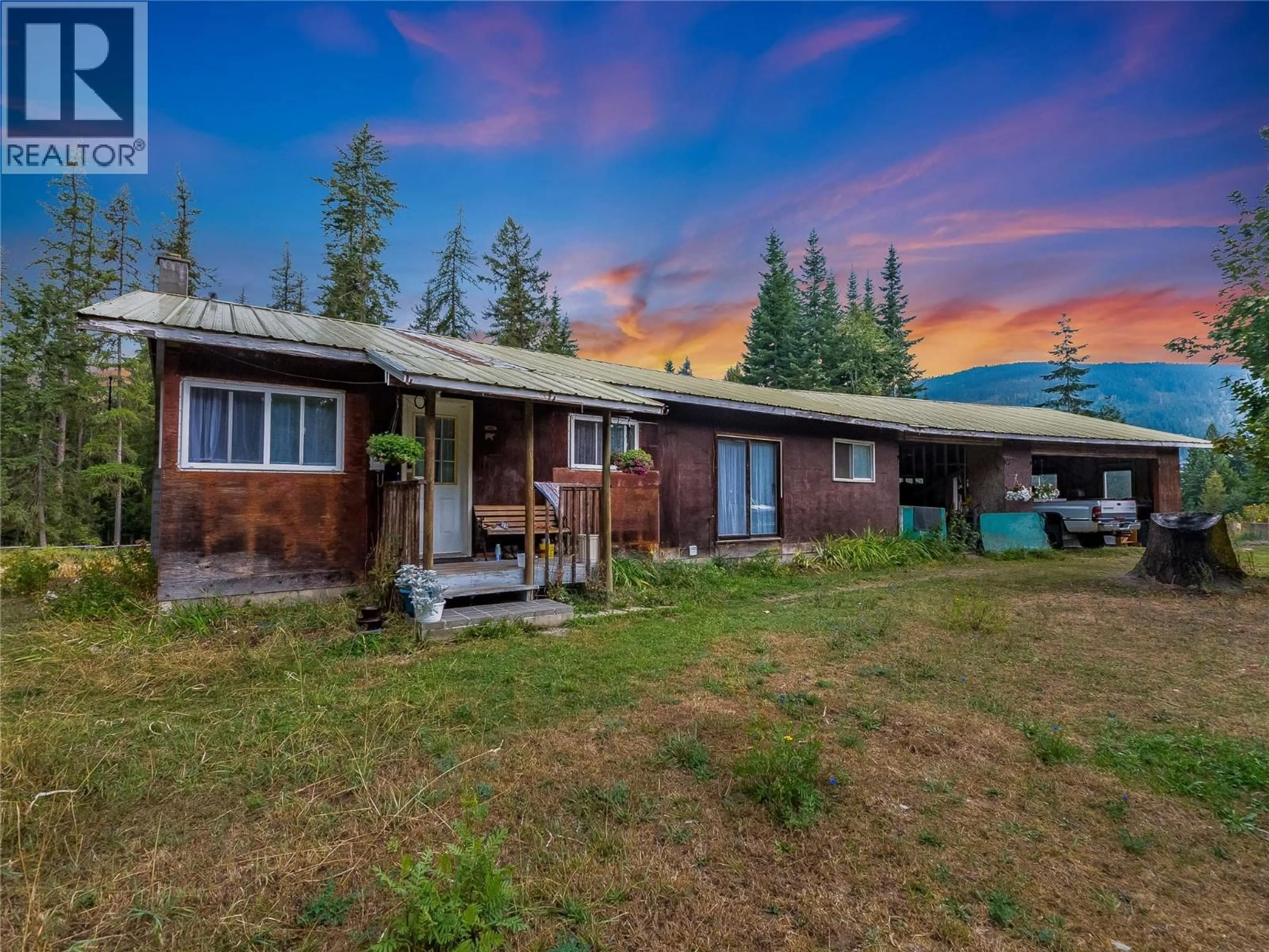 A pic from outside/outdoor area/front of a property/back of a property/a pic from drone, mountain view for 4604 BLEWETT ROAD, Nelson British Columbia V1L6X4