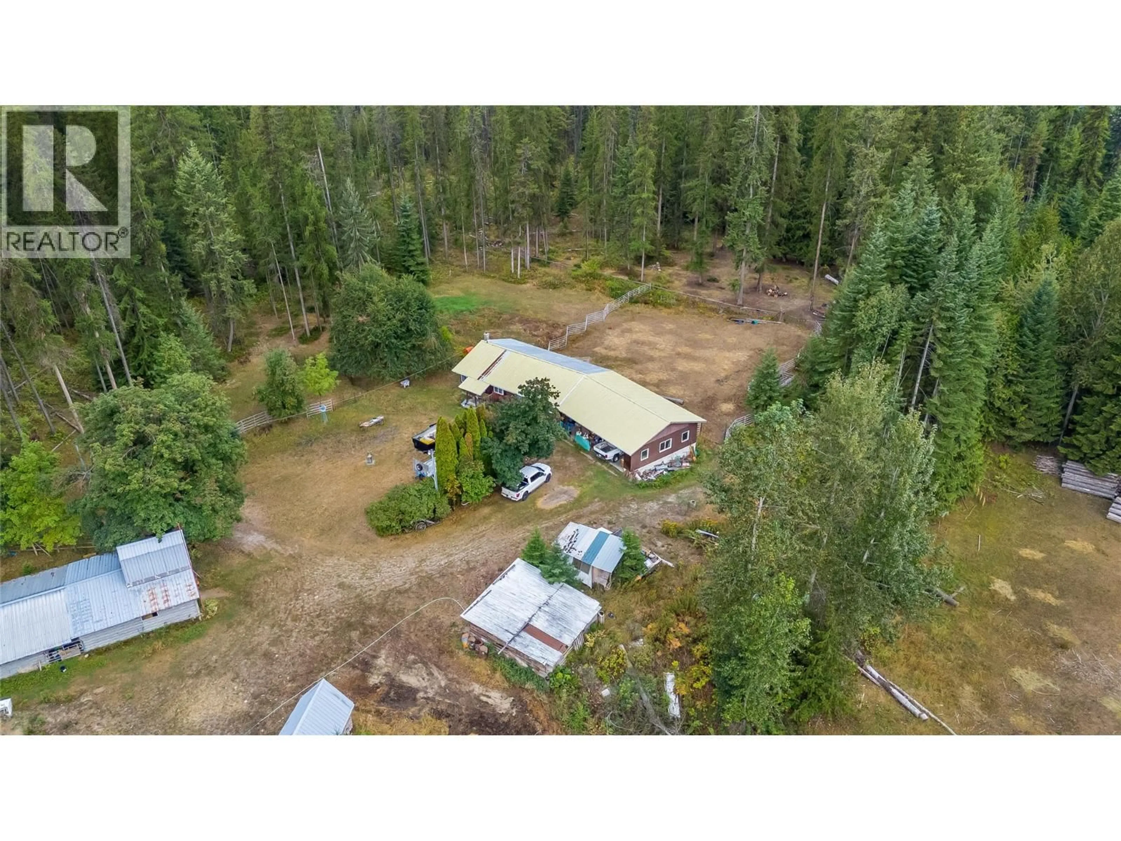 A pic from outside/outdoor area/front of a property/back of a property/a pic from drone, forest/trees view for 4604 BLEWETT ROAD, Nelson British Columbia V1L6X4