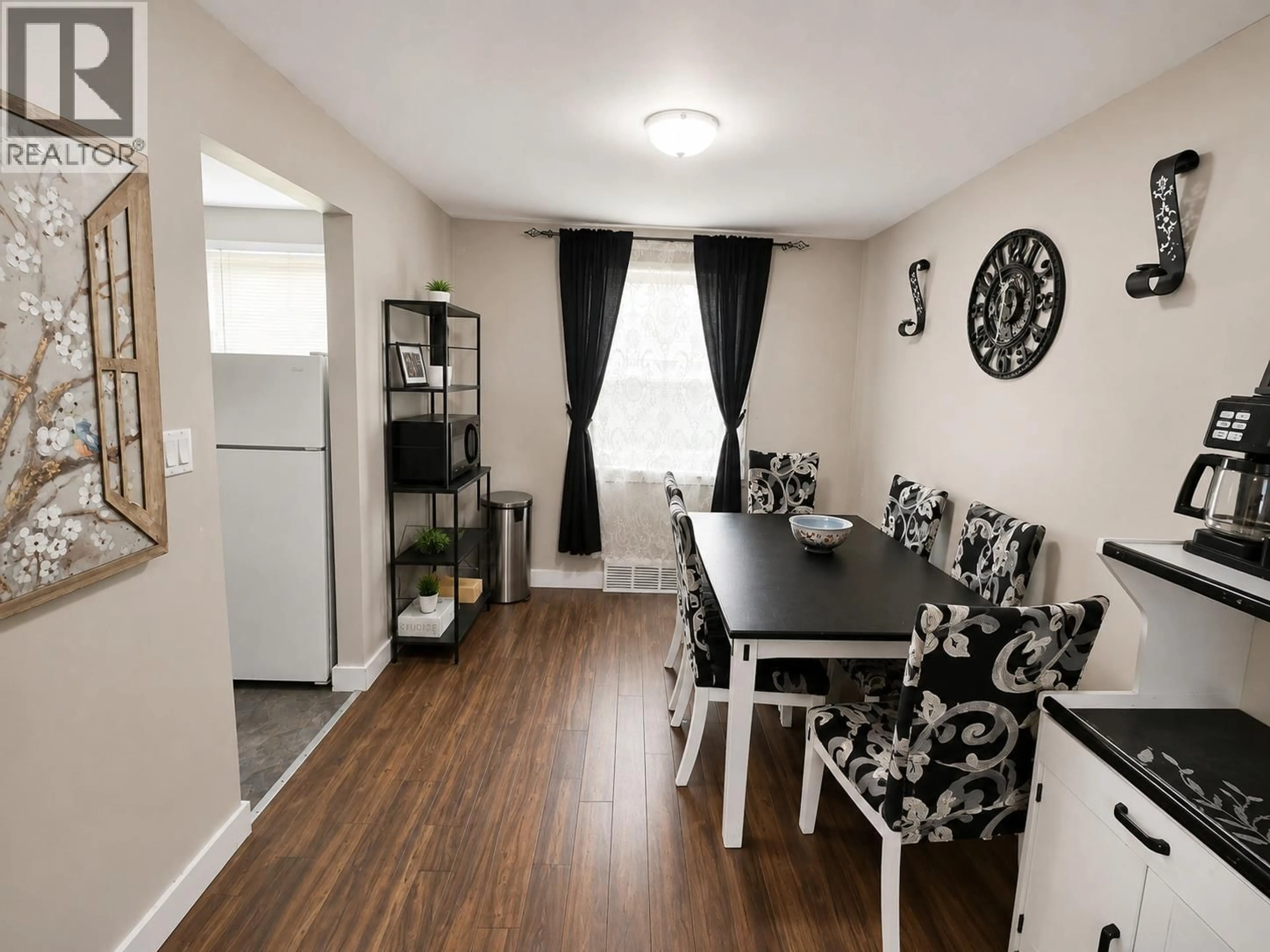 Dining room, wood/laminate floor for 1710 110TH AVENUE, Dawson Creek British Columbia V1G2V4