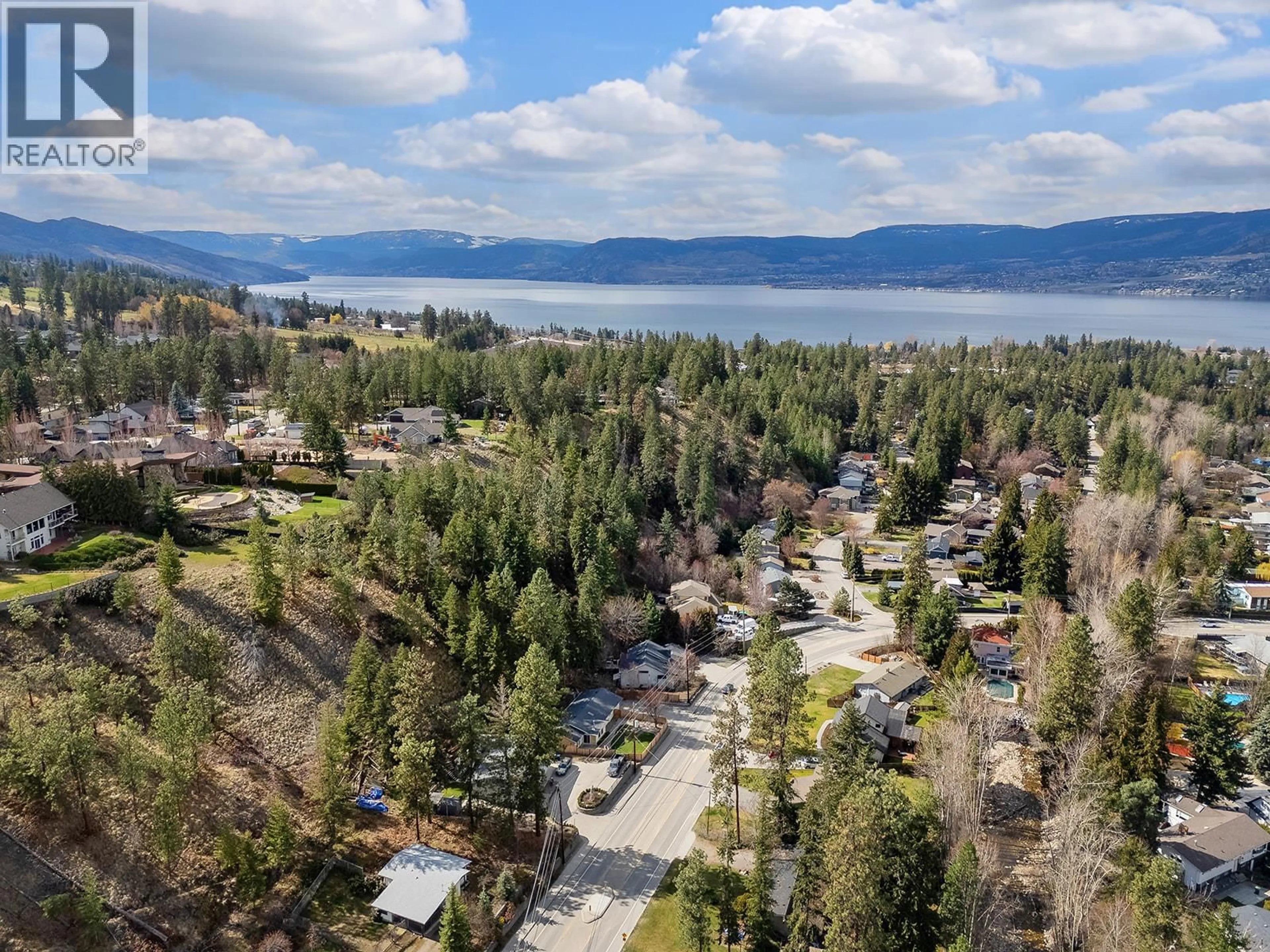 A pic from outside/outdoor area/front of a property/back of a property/a pic from drone, water/lake/river/ocean view for 4700 GORDON DRIVE, Kelowna British Columbia V1W4P4