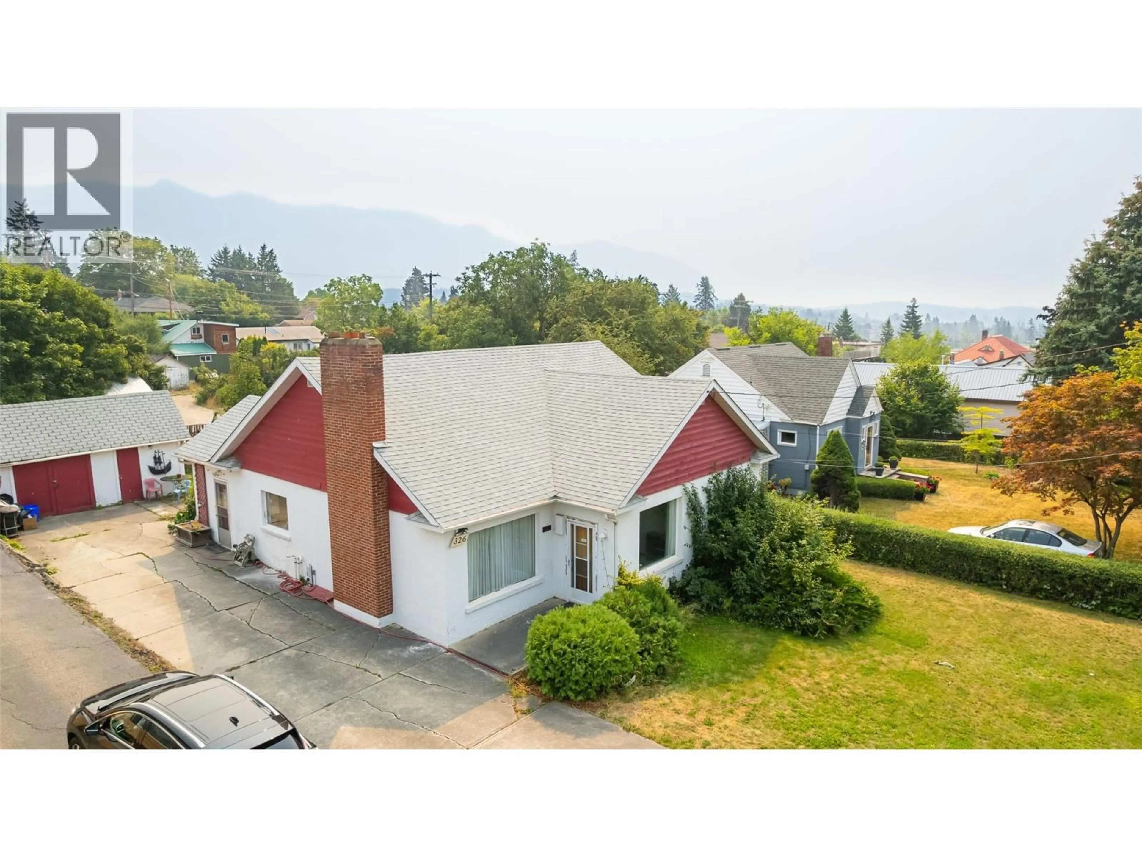 A pic from outside/outdoor area/front of a property/back of a property/a pic from drone, mountain view for 326 10TH AVENUE NORTH, Creston British Columbia V0B1G0