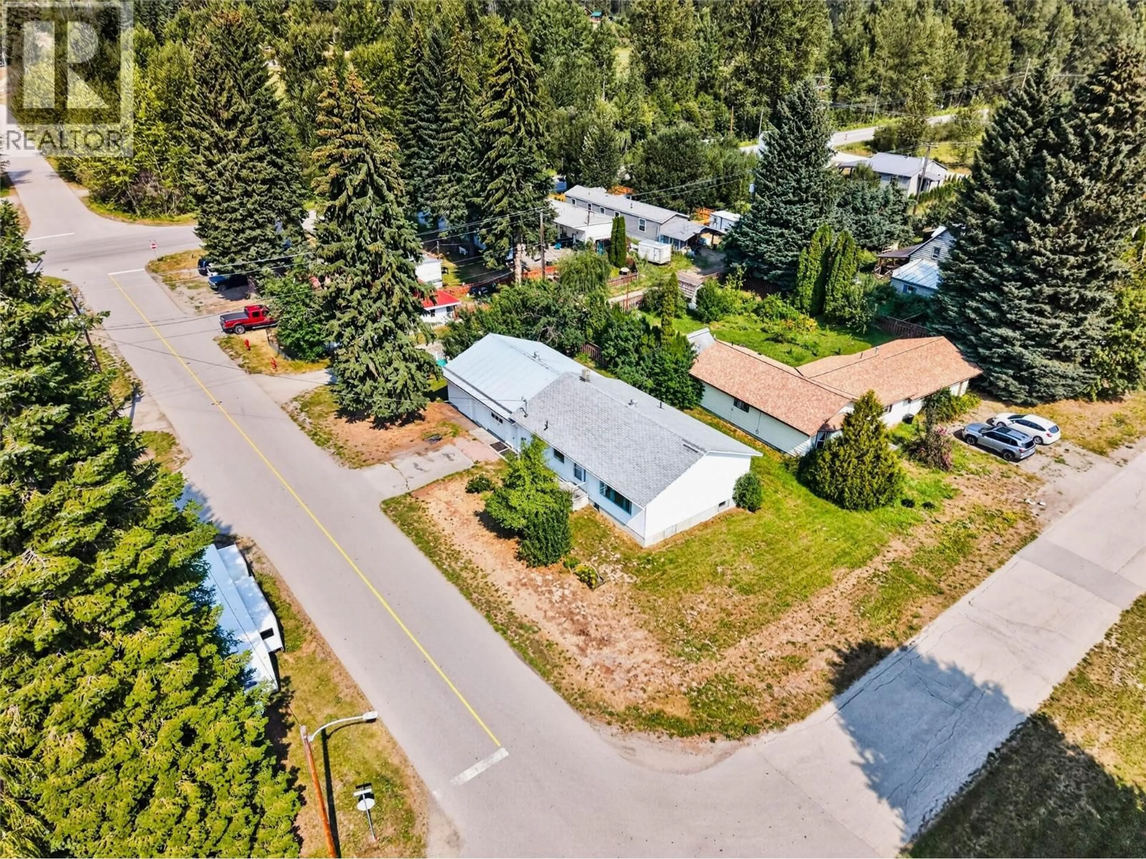 A pic from outside/outdoor area/front of a property/back of a property/a pic from drone, street for 115 SECOND STREET, Salmo British Columbia V0G1Z0