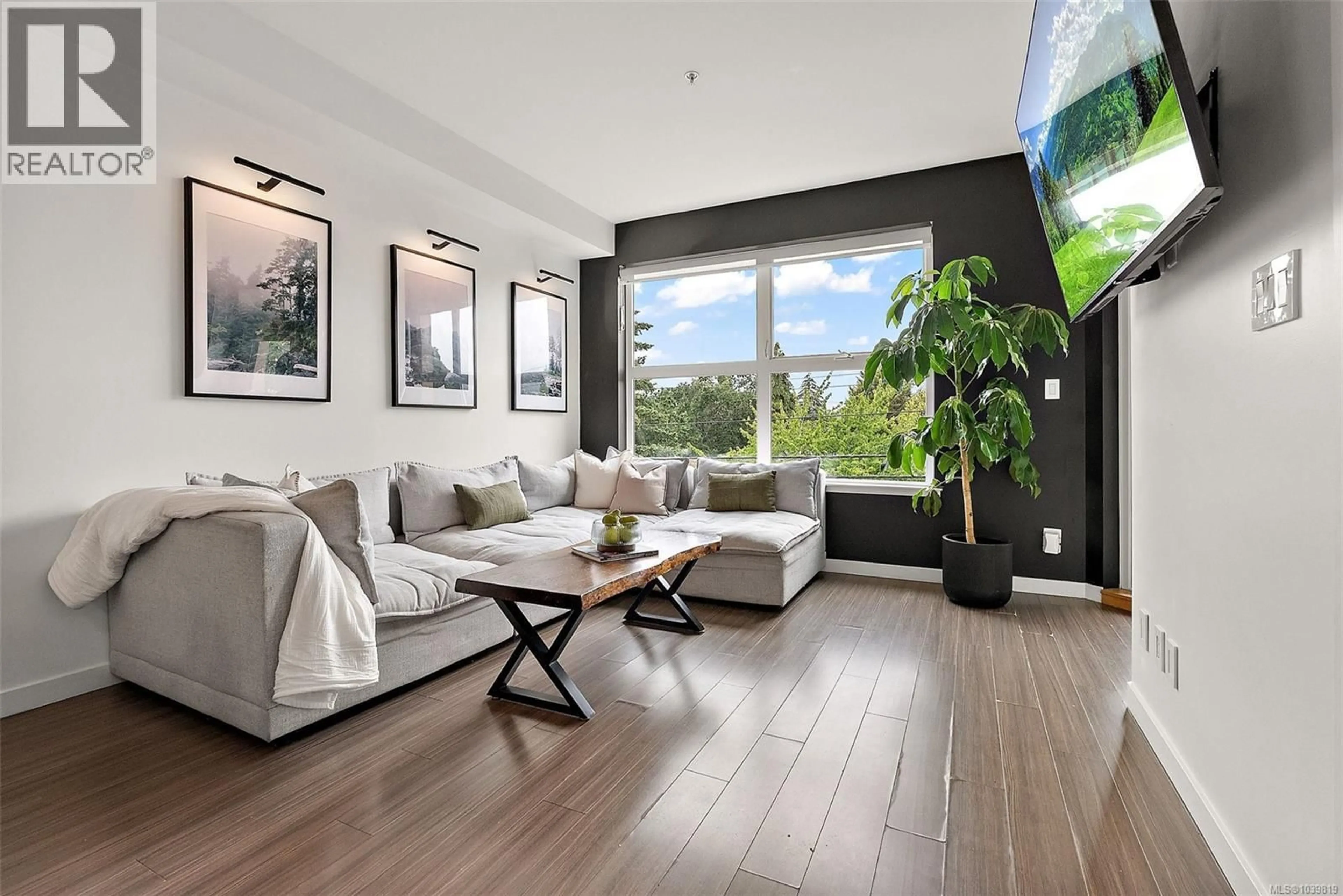 Living room with furniture, wood/laminate floor for 326 - 2871 JACKLIN ROAD, Langford British Columbia V9B0P3