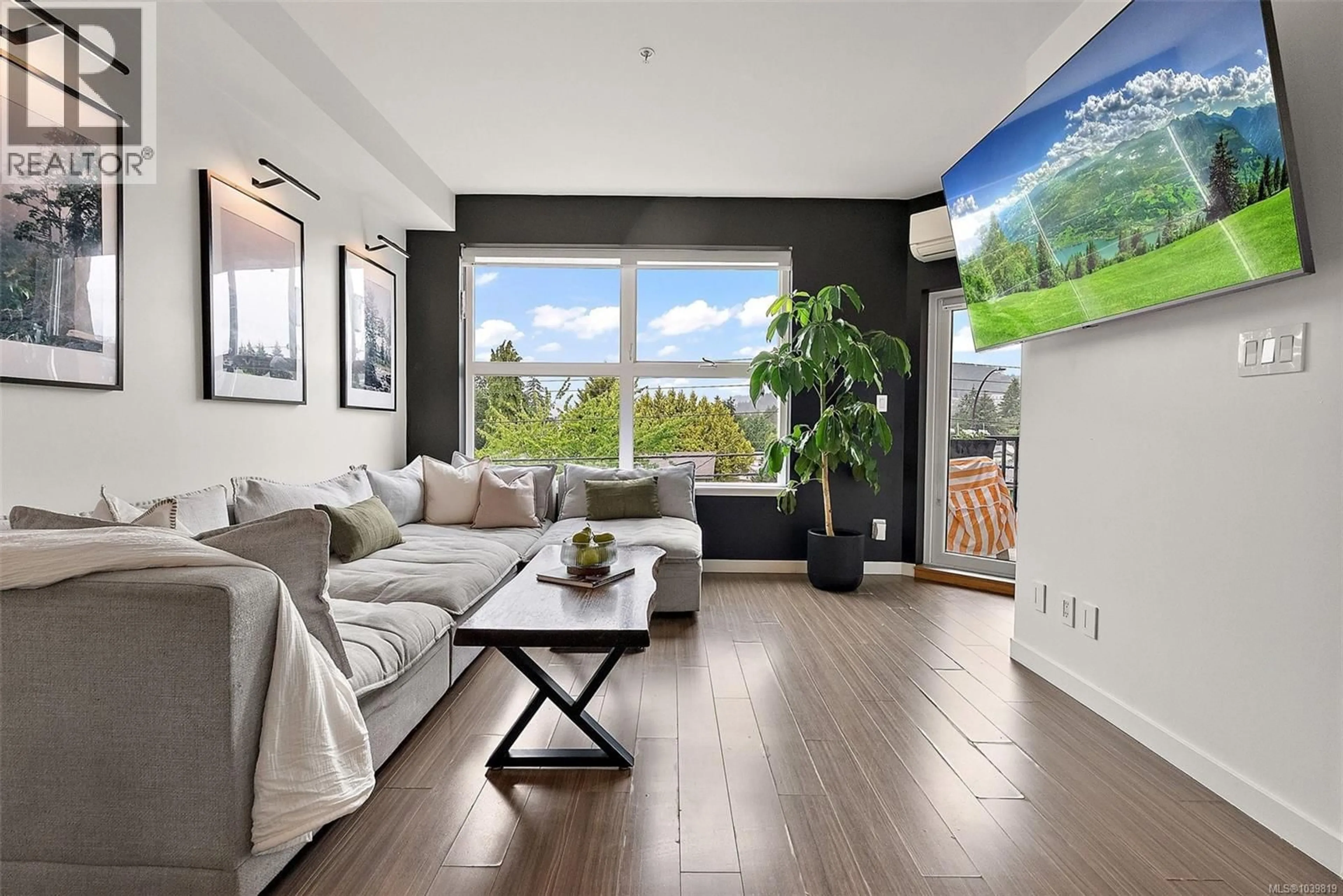 Living room with furniture, wood/laminate floor for 326 - 2871 JACKLIN ROAD, Langford British Columbia V9B0P3