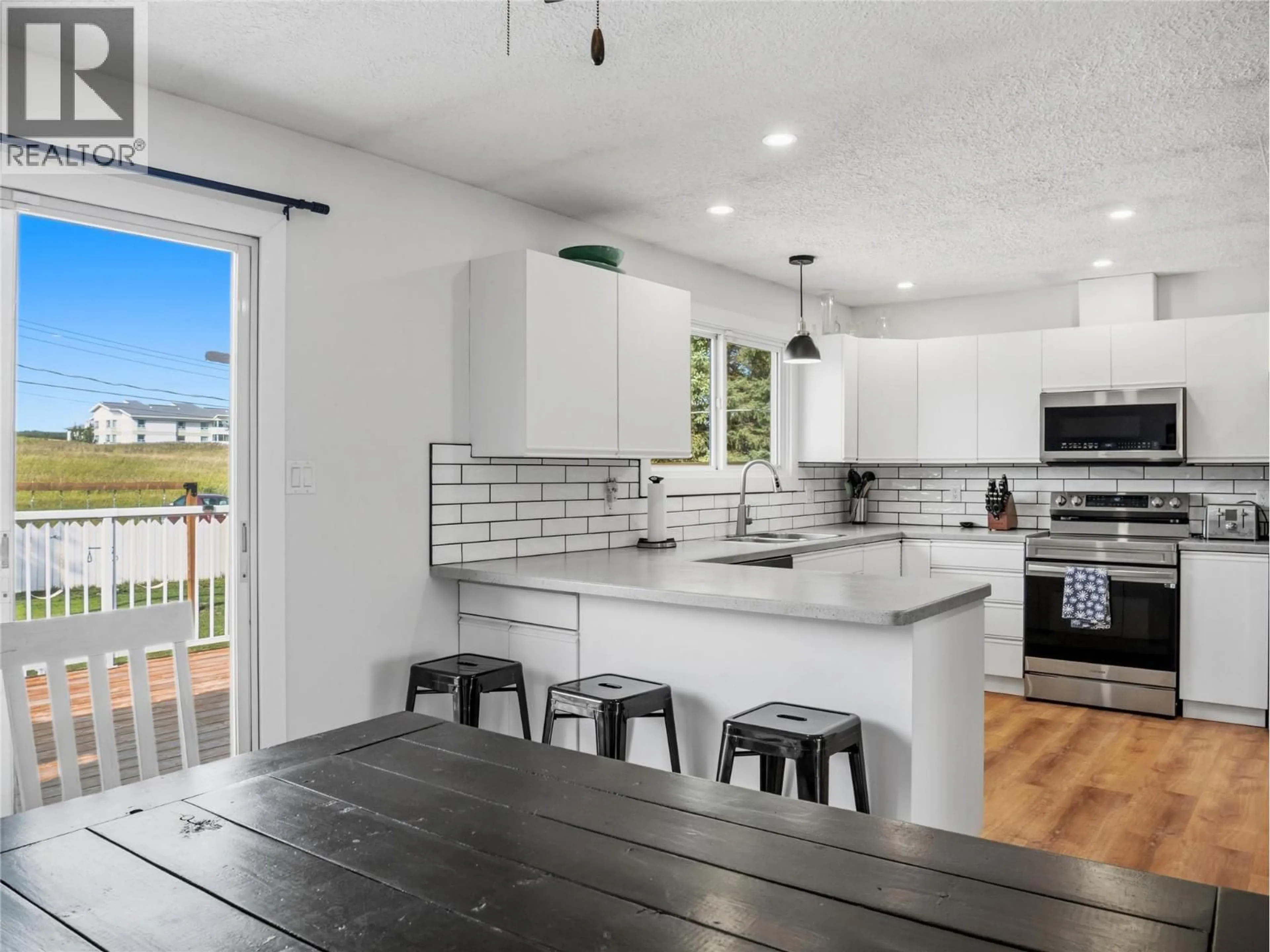 Open concept kitchen, unknown for 1312 92 AVENUE, Dawson Creek British Columbia V1G1C3