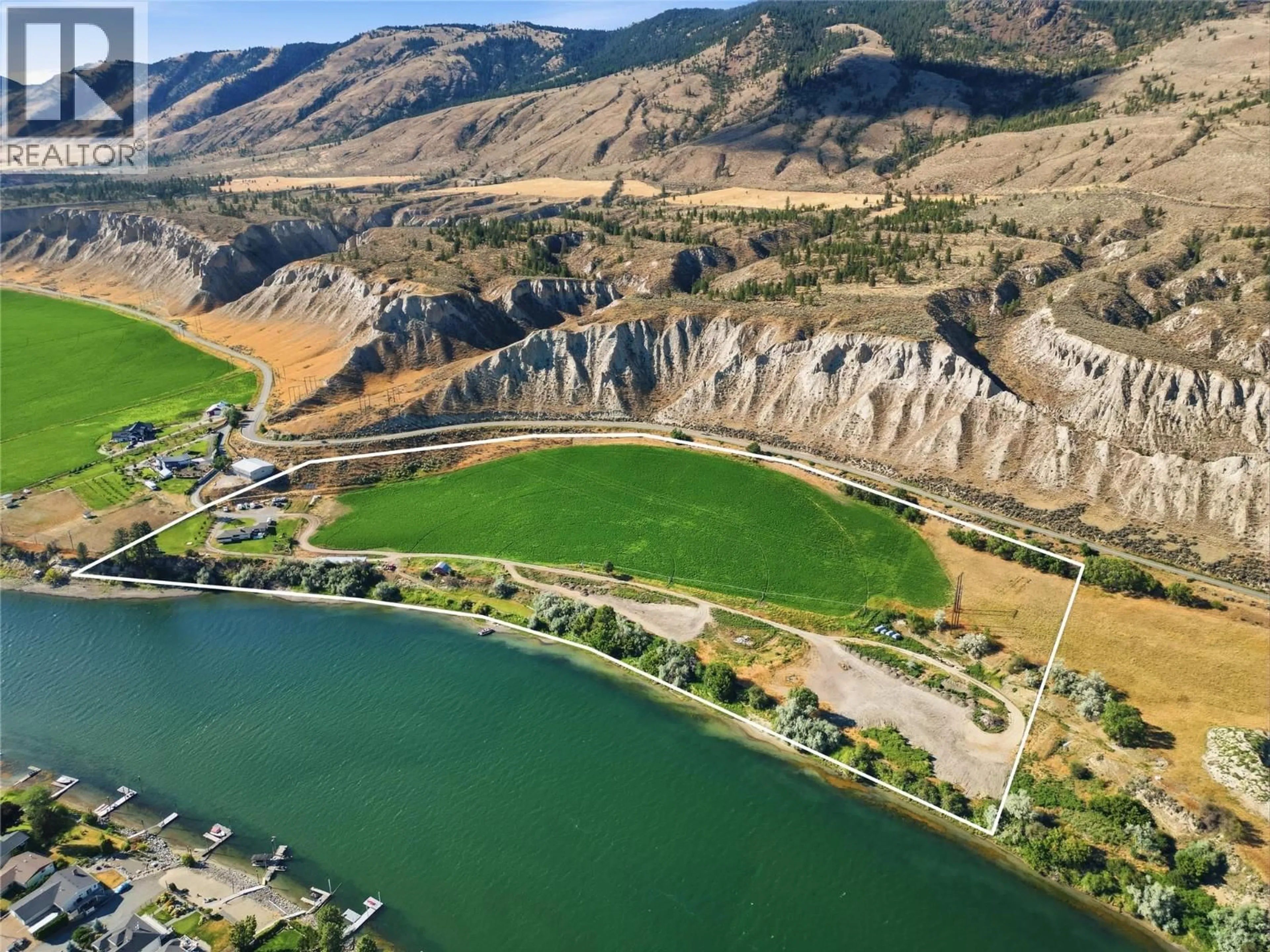 A pic from outside/outdoor area/front of a property/back of a property/a pic from drone, water/lake/river/ocean view for SHUSWAP ROAD EAST, Kamloops British Columbia V2H1S9