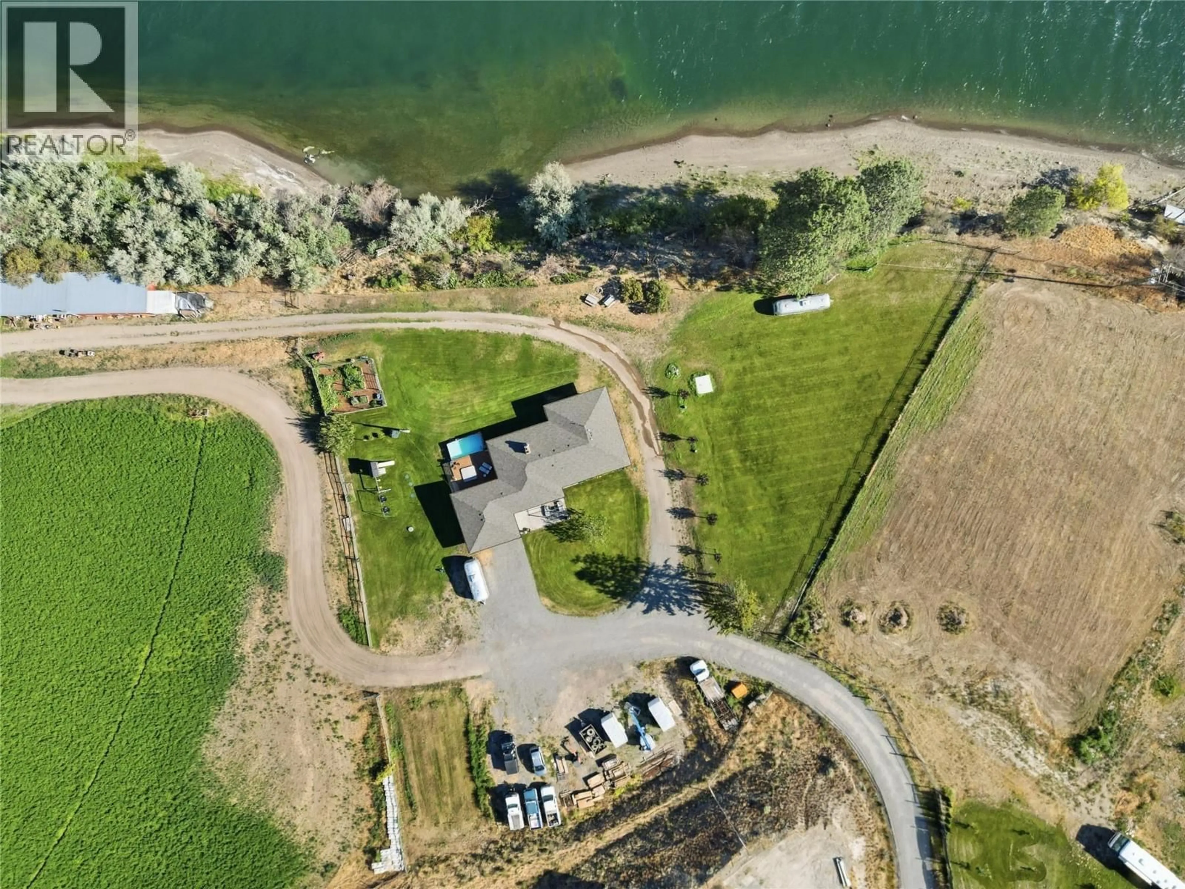 A pic from outside/outdoor area/front of a property/back of a property/a pic from drone, water/lake/river/ocean view for SHUSWAP ROAD EAST, Kamloops British Columbia V2H1S9