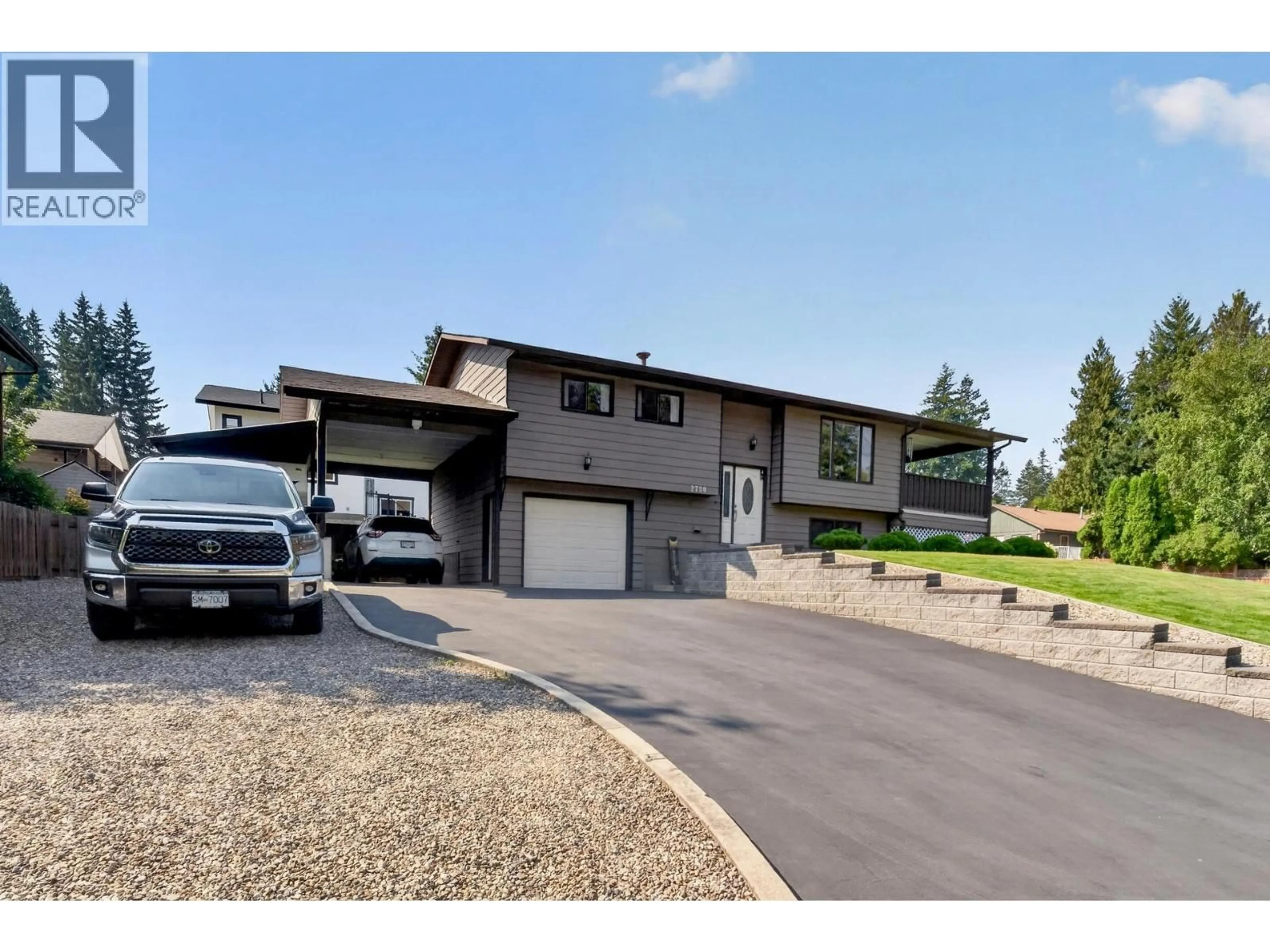 Home with vinyl exterior material, street for 2730 5 AVENUE NORTHEAST, Salmon Arm British Columbia V1E2K3