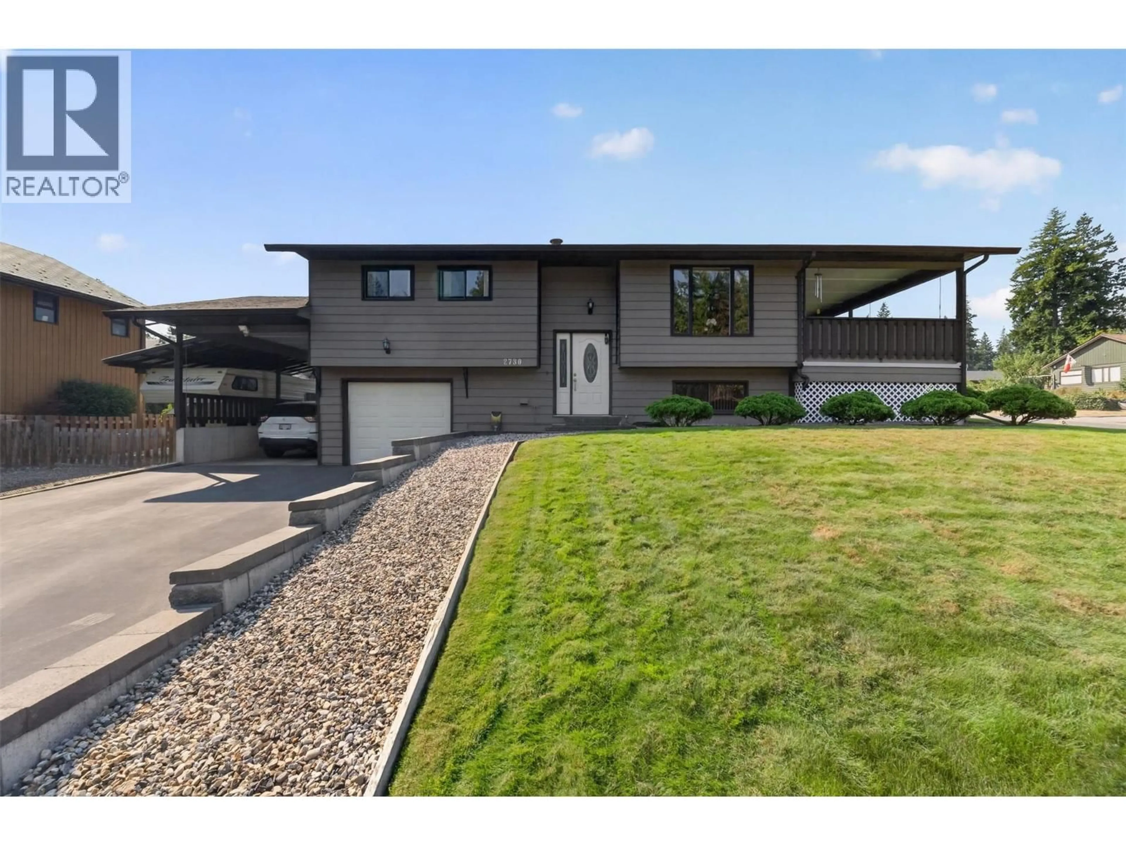 Home with vinyl exterior material, street for 2730 5 AVENUE NORTHEAST, Salmon Arm British Columbia V1E2K3