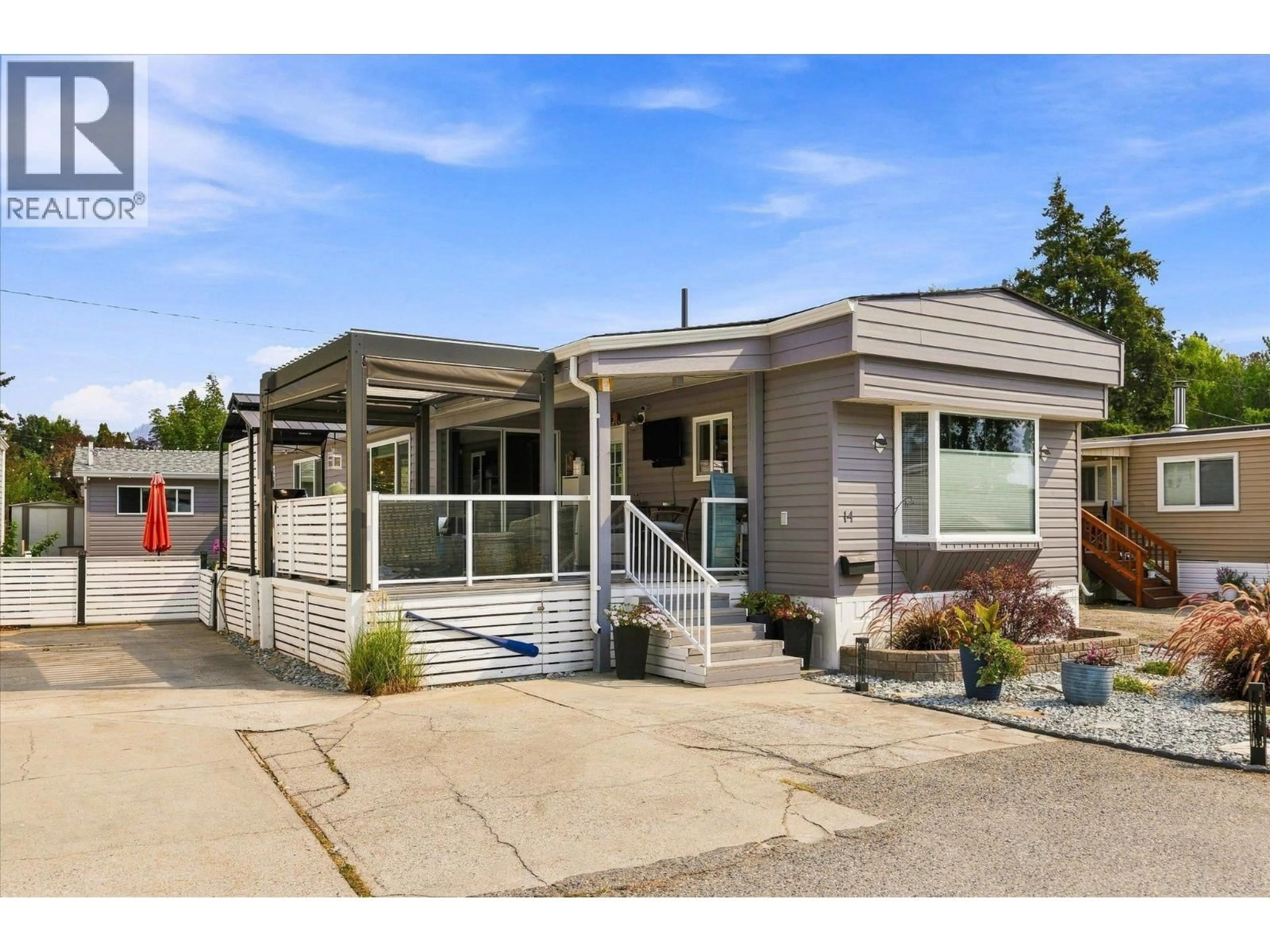 Home with vinyl exterior material, street for 14 - 2095 BOUCHERIE ROAD, West Kelowna British Columbia V4T1Z4