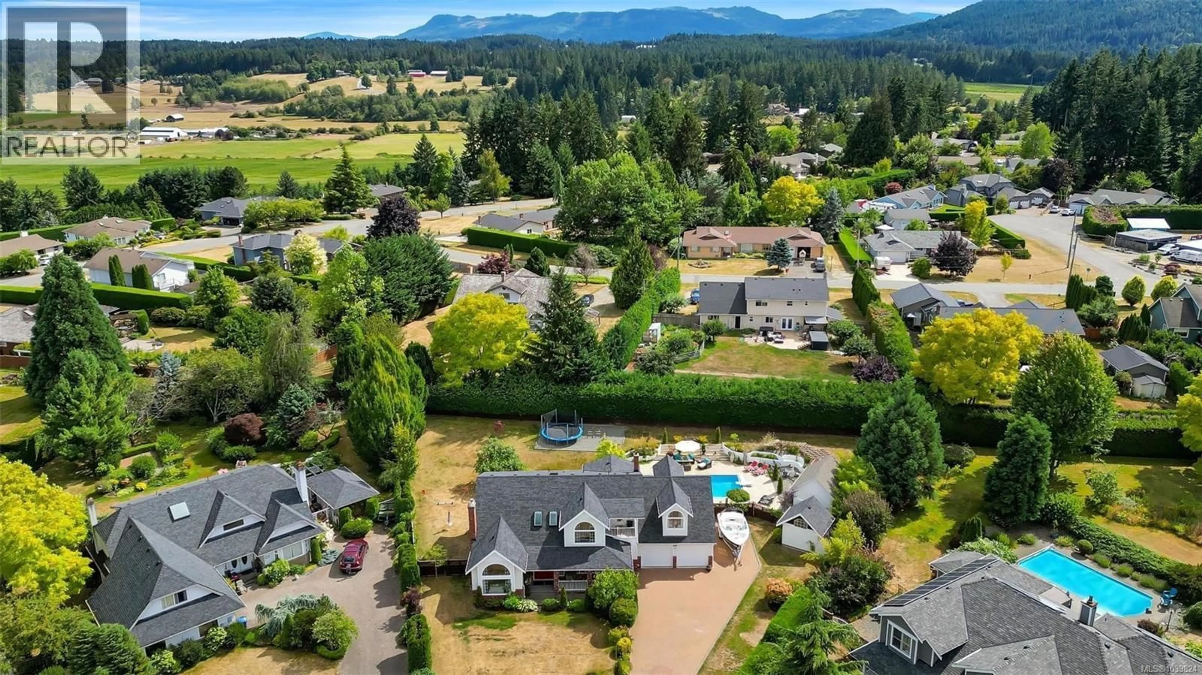 A pic from outside/outdoor area/front of a property/back of a property/a pic from drone, mountain view for 4210 DOUGLAS VALE PLACE, Cobble Hill British Columbia V0R1L0