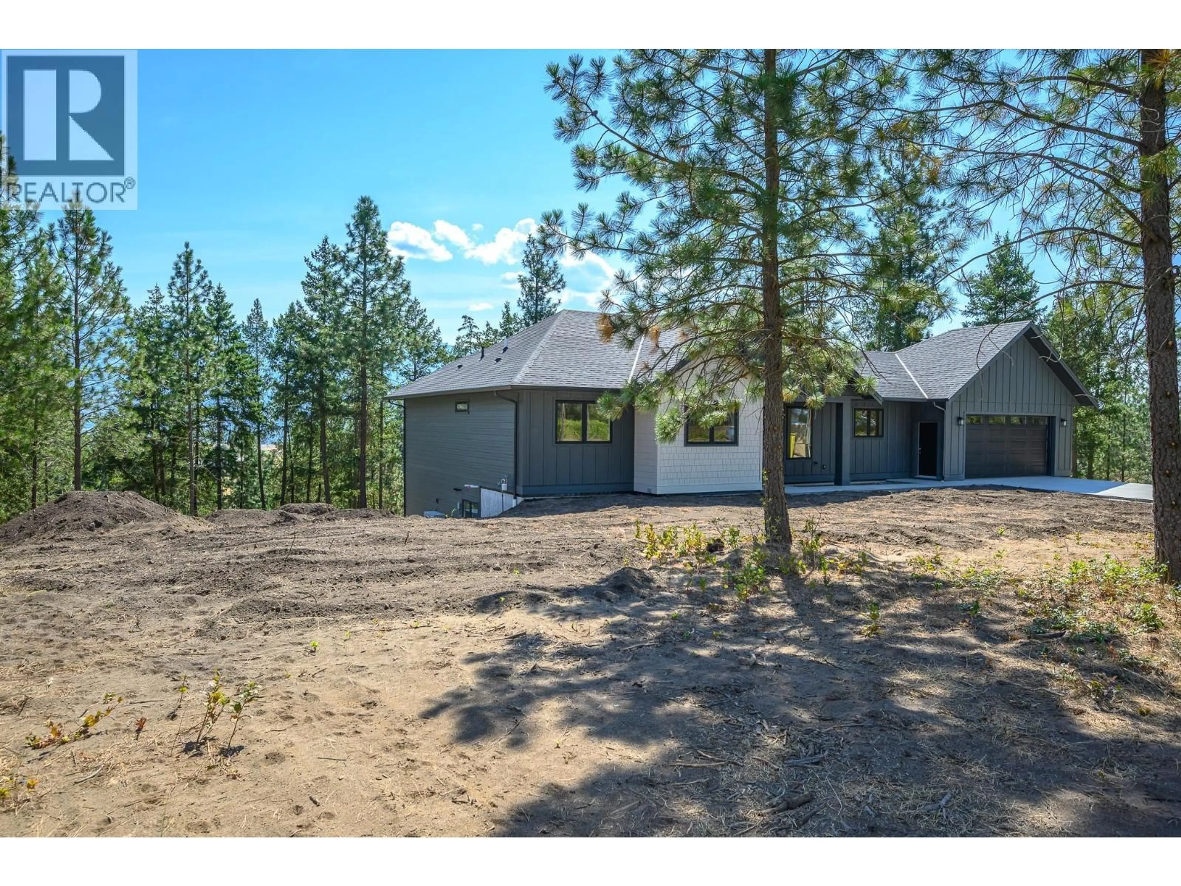 A pic from outside/outdoor area/front of a property/back of a property/a pic from drone, forest/trees view for 4832 GULCH ROAD, Spallumcheen British Columbia V4Y0V1
