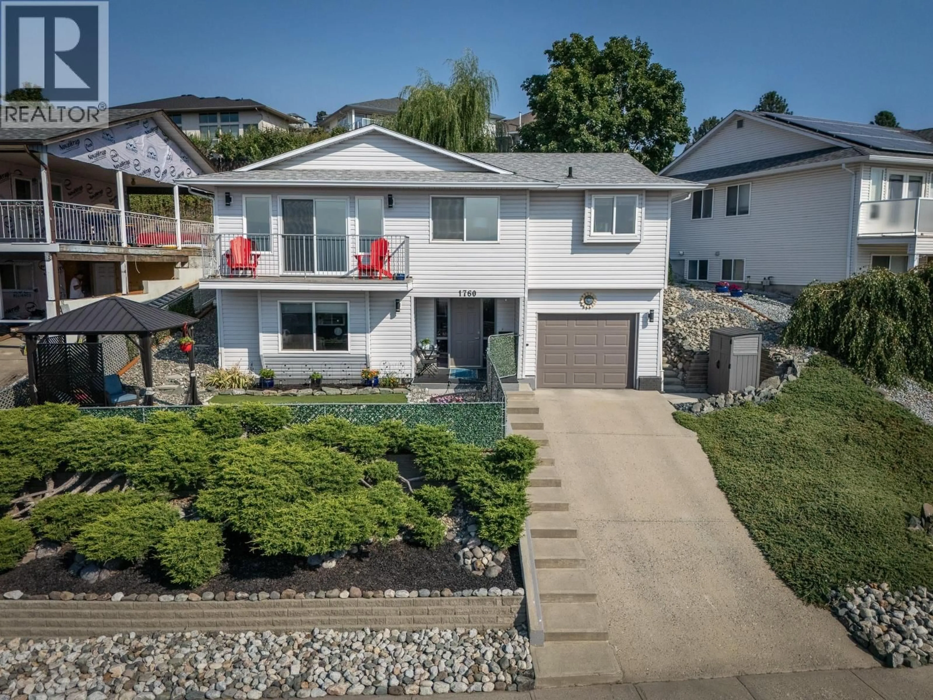 A pic from outside/outdoor area/front of a property/back of a property/a pic from drone, street for 1760 NORTH RIVER DRIVE, Kamloops British Columbia V2B7N7
