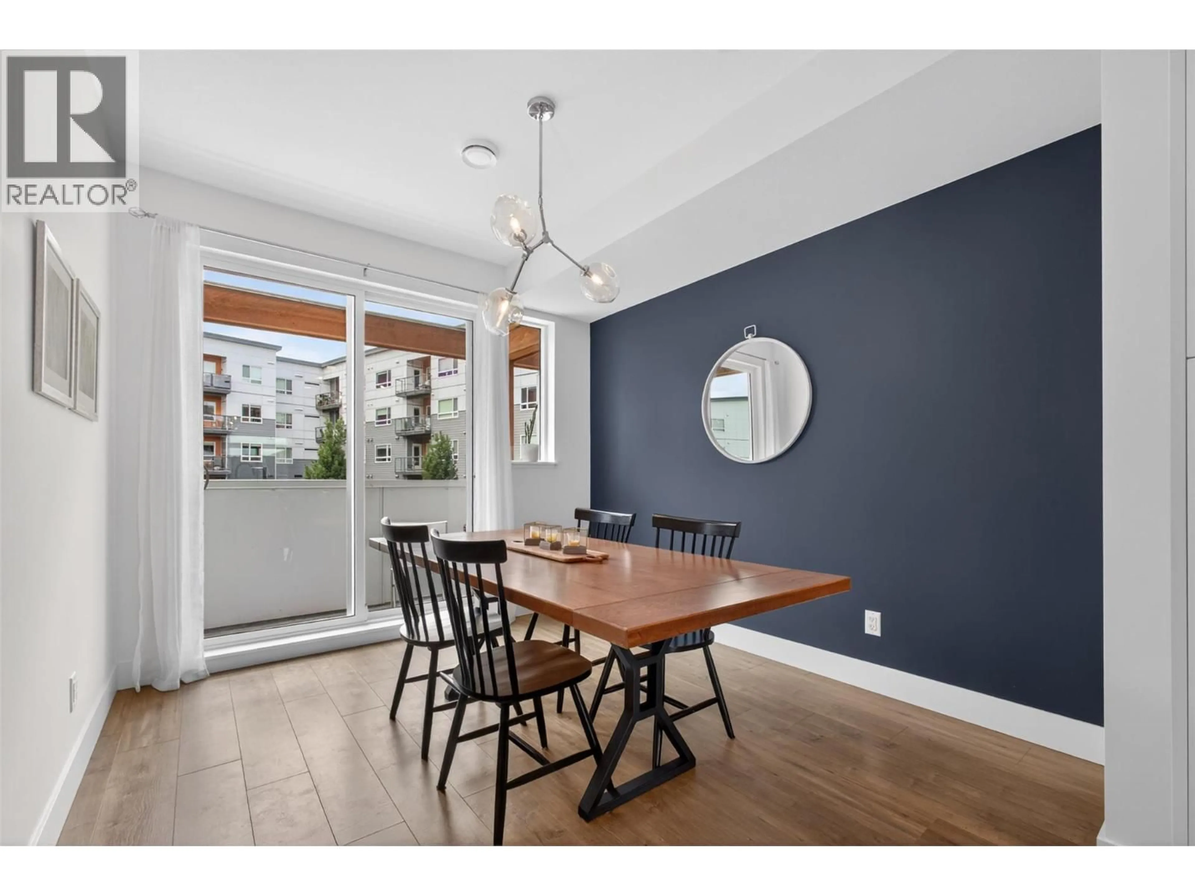 Dining room, wood/laminate floor for 28 - 720 VALLEY ROAD, Kelowna British Columbia V1V2E6