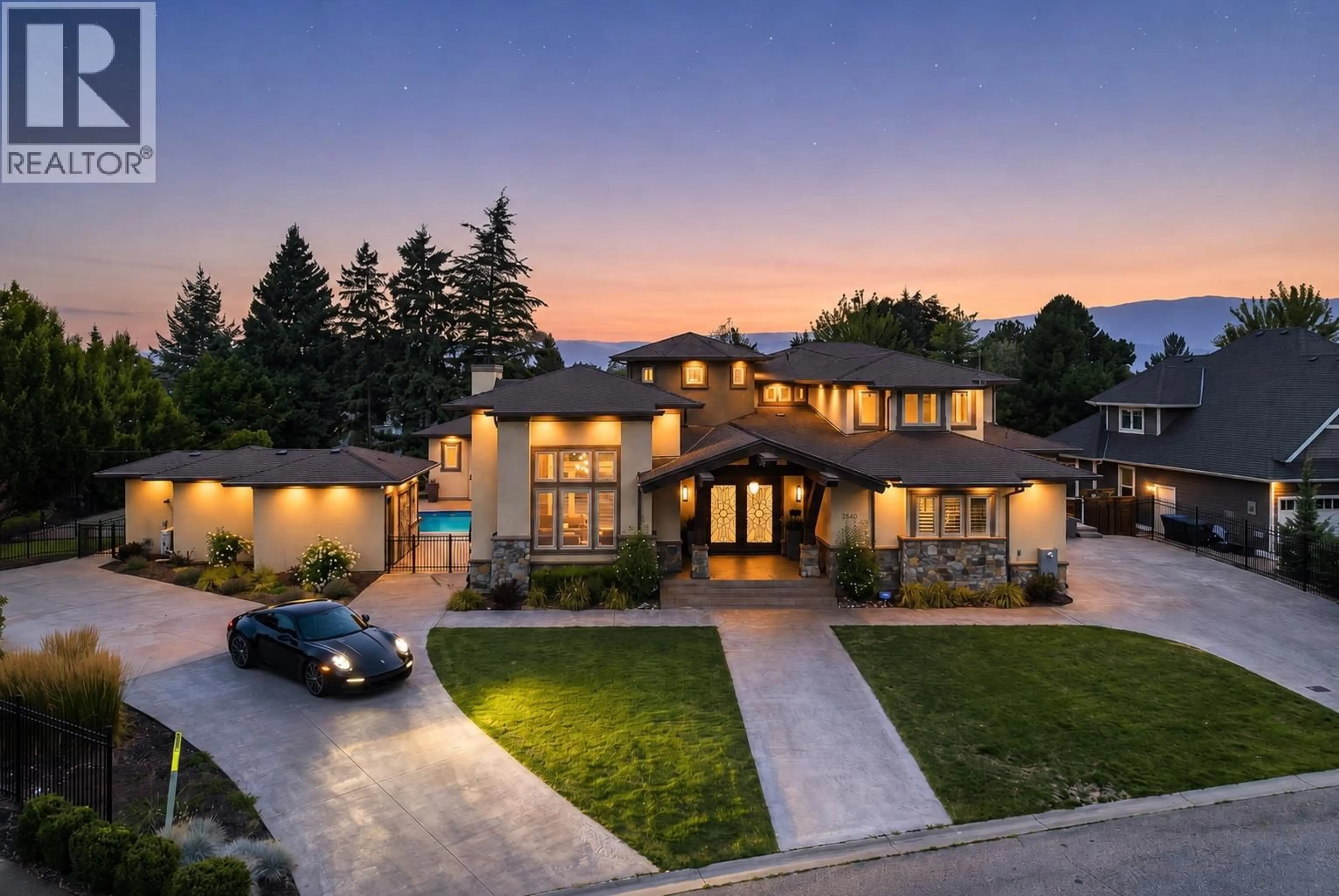Home with brick exterior material, mountain view for 4466 RATTENBURY COURT, Kelowna British Columbia V1W5J3