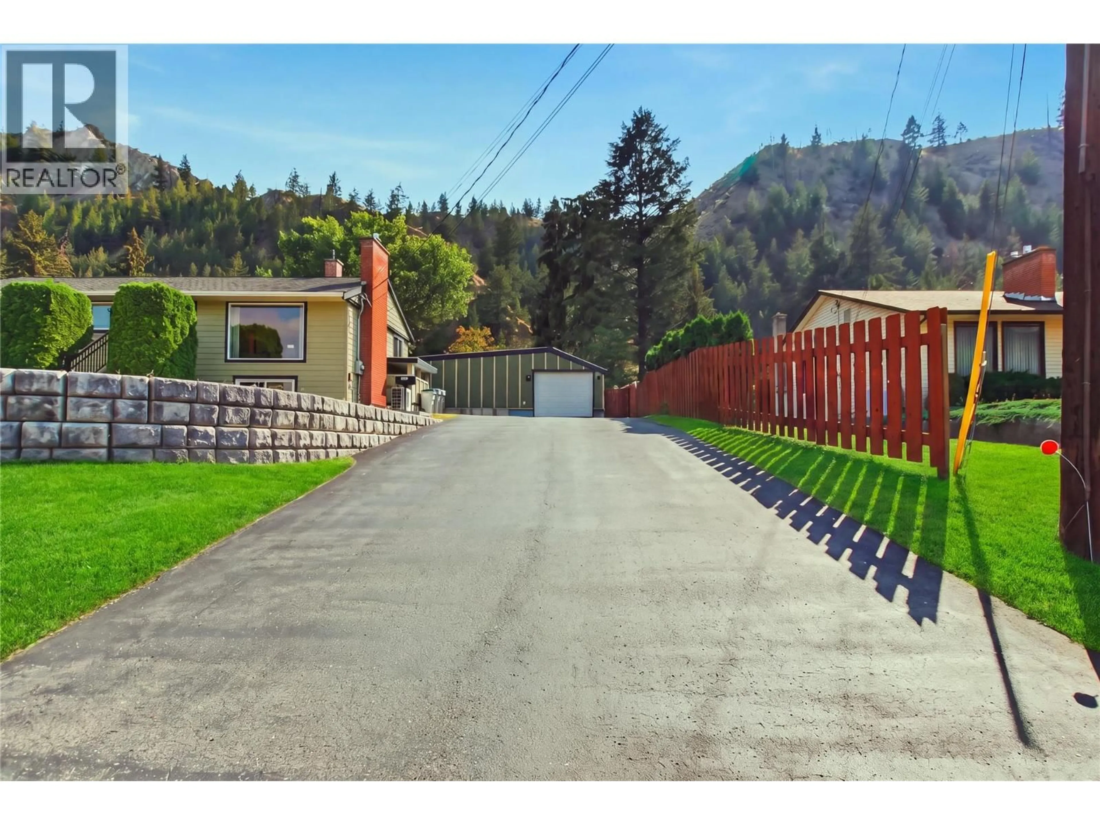 A pic from outside/outdoor area/front of a property/back of a property/a pic from drone, street for 5697 DALLAS DRIVE, Kamloops British Columbia V2C4W9