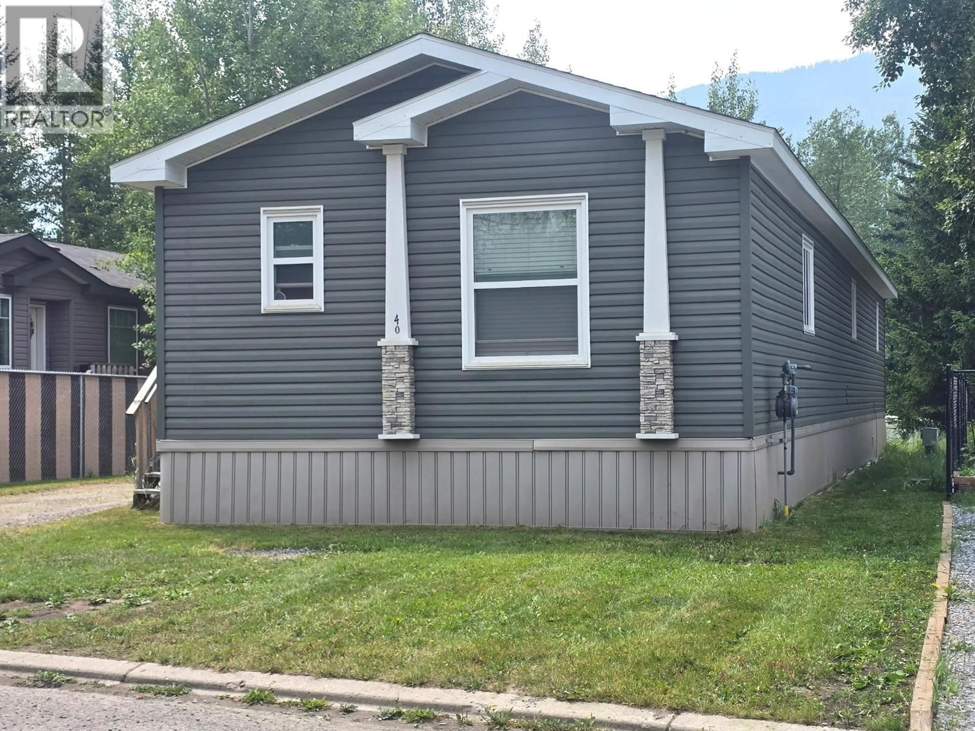 Home with vinyl exterior material, street for 40 WILDERNESS  HEIGHTS WAY, Elkford British Columbia V0B1H0