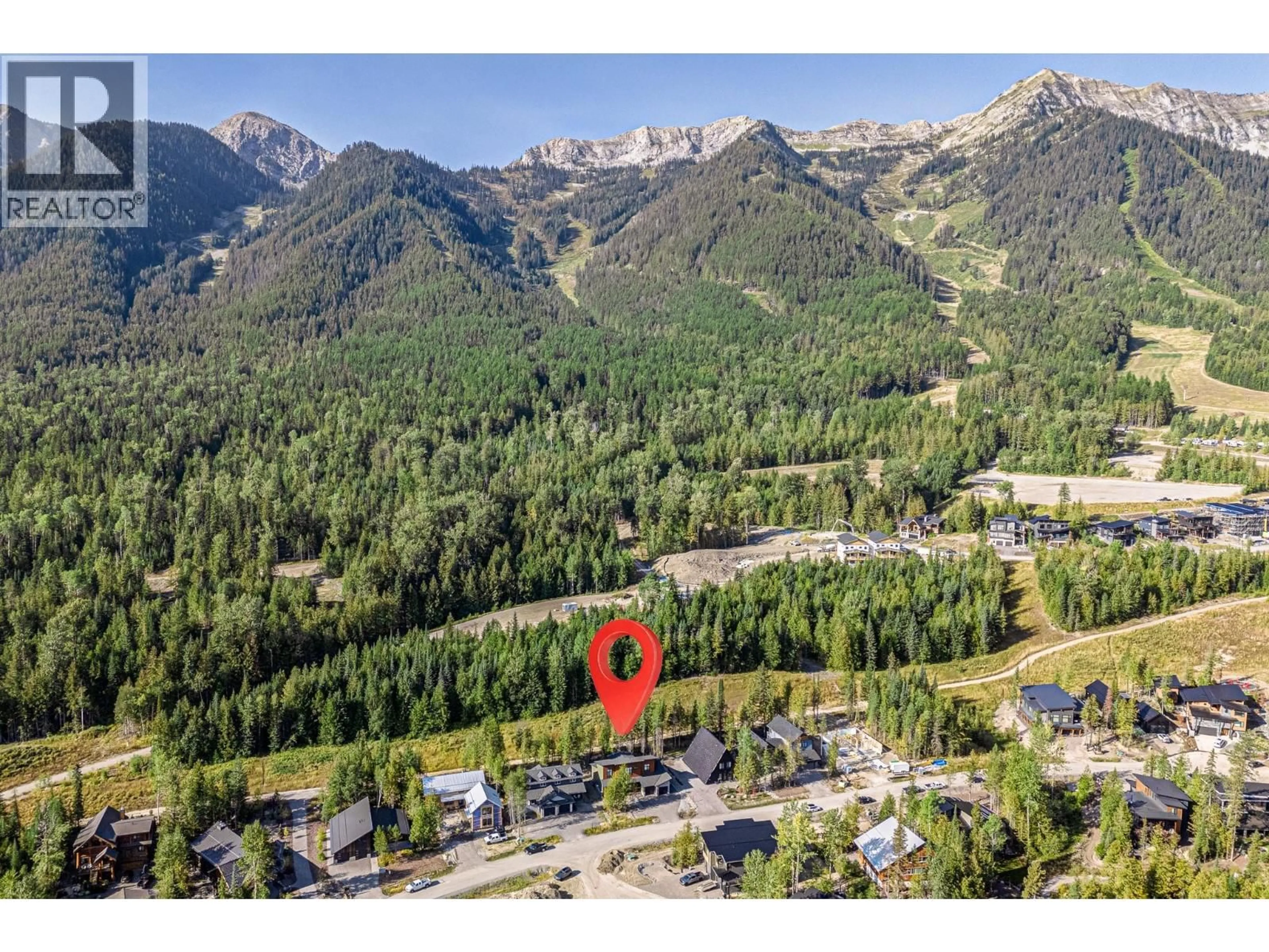 A pic from outside/outdoor area/front of a property/back of a property/a pic from drone, mountain view for 5550 CURRIE BOWL WAY, Fernie British Columbia V0B1M6