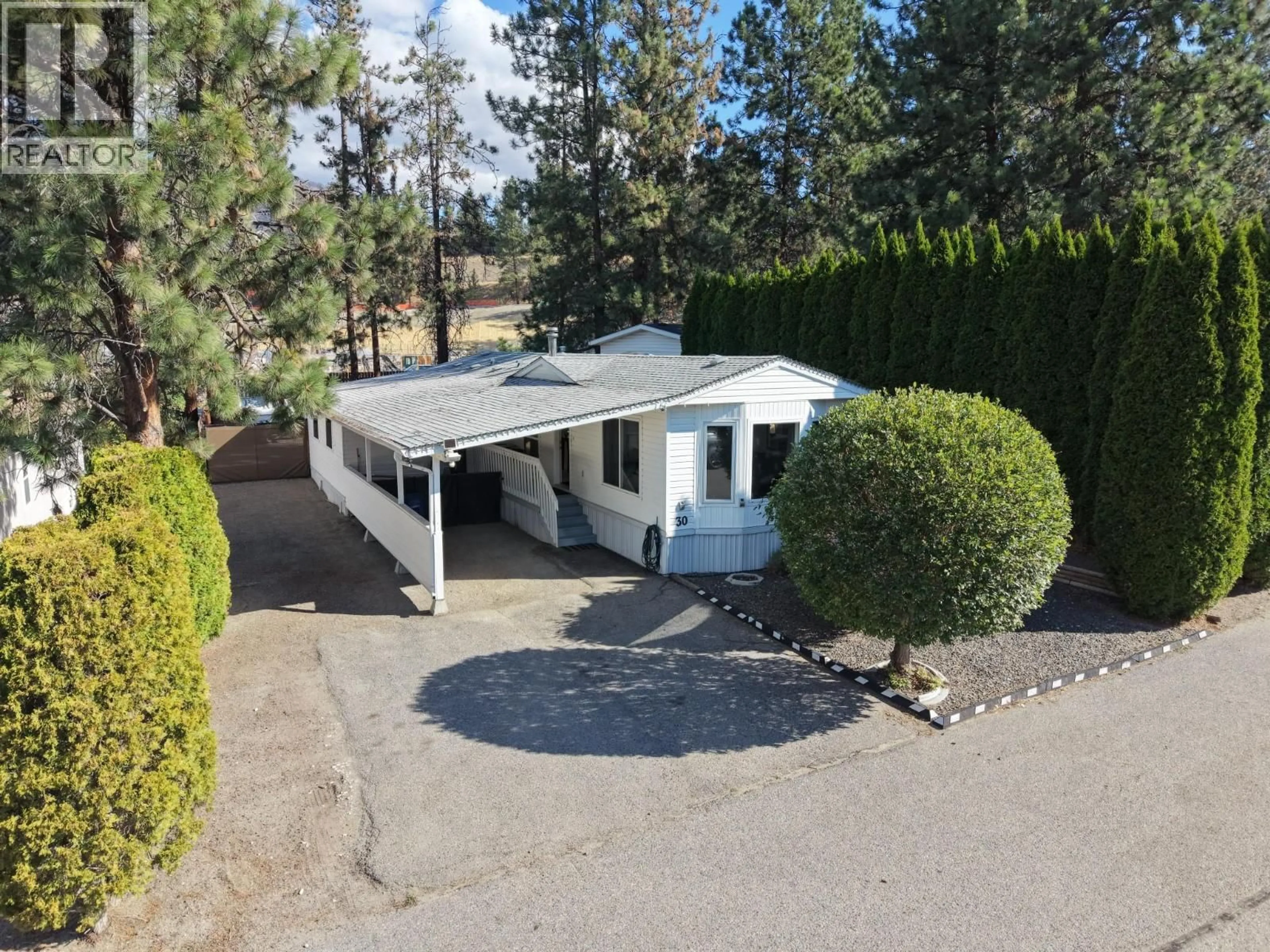 A pic from outside/outdoor area/front of a property/back of a property/a pic from drone, street for 30 - 3225 SHANNON LAKE ROAD, Westbank British Columbia V4T2E2
