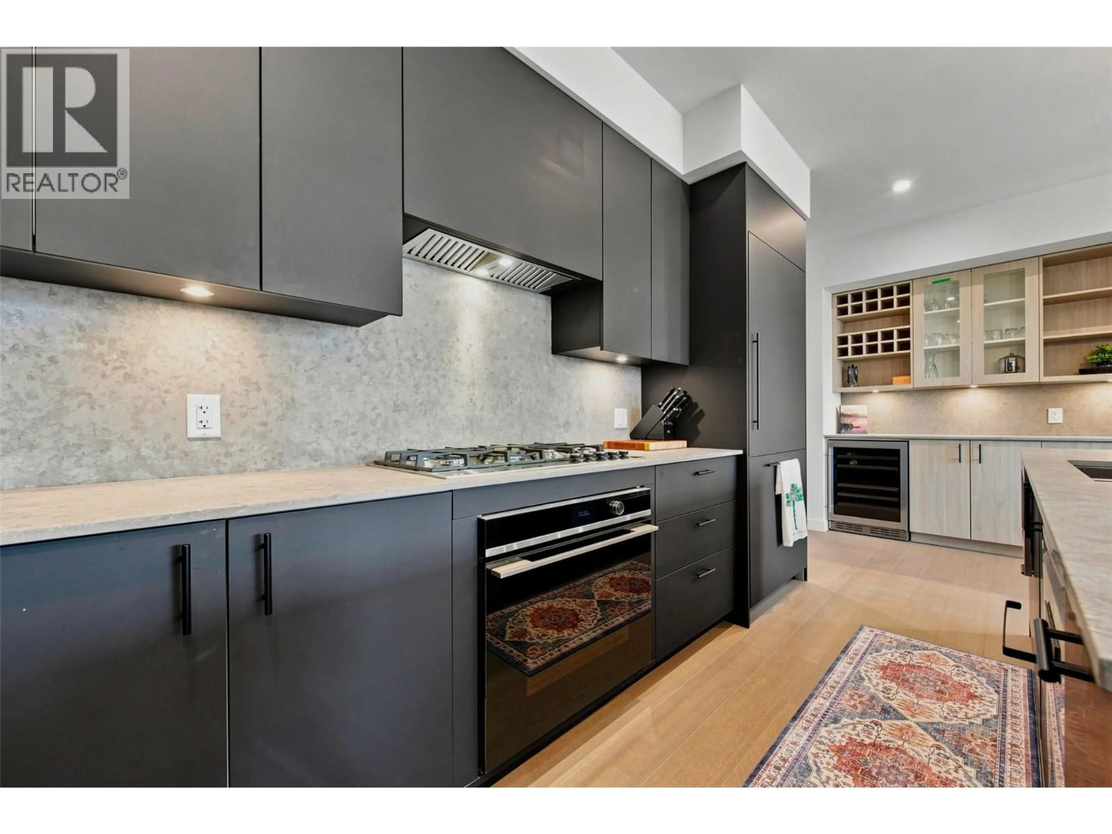 Contemporary kitchen, ceramic/tile floor for 307 - 9652 BENCHLAND DRIVE, Lake Country British Columbia V4V0C4