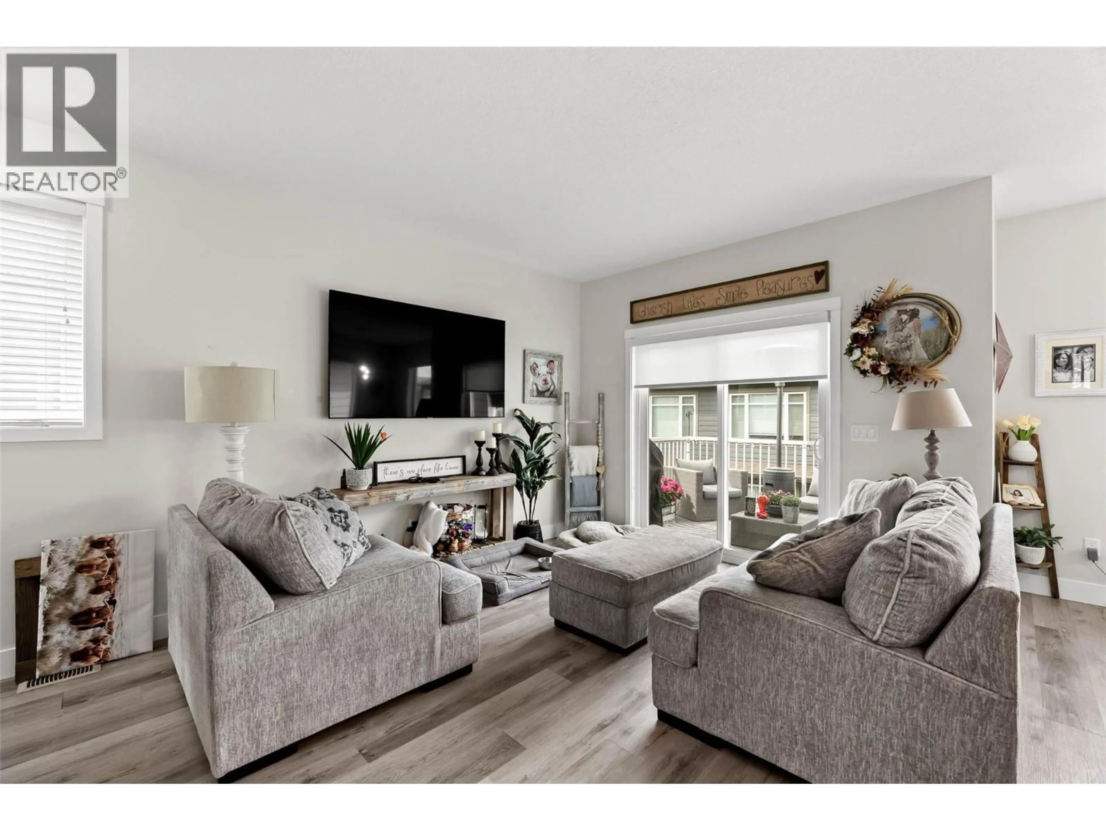 Living room with furniture, wood/laminate floor for 175 - 200 GRAND BOULEVARD, Kamloops British Columbia V2C0H3