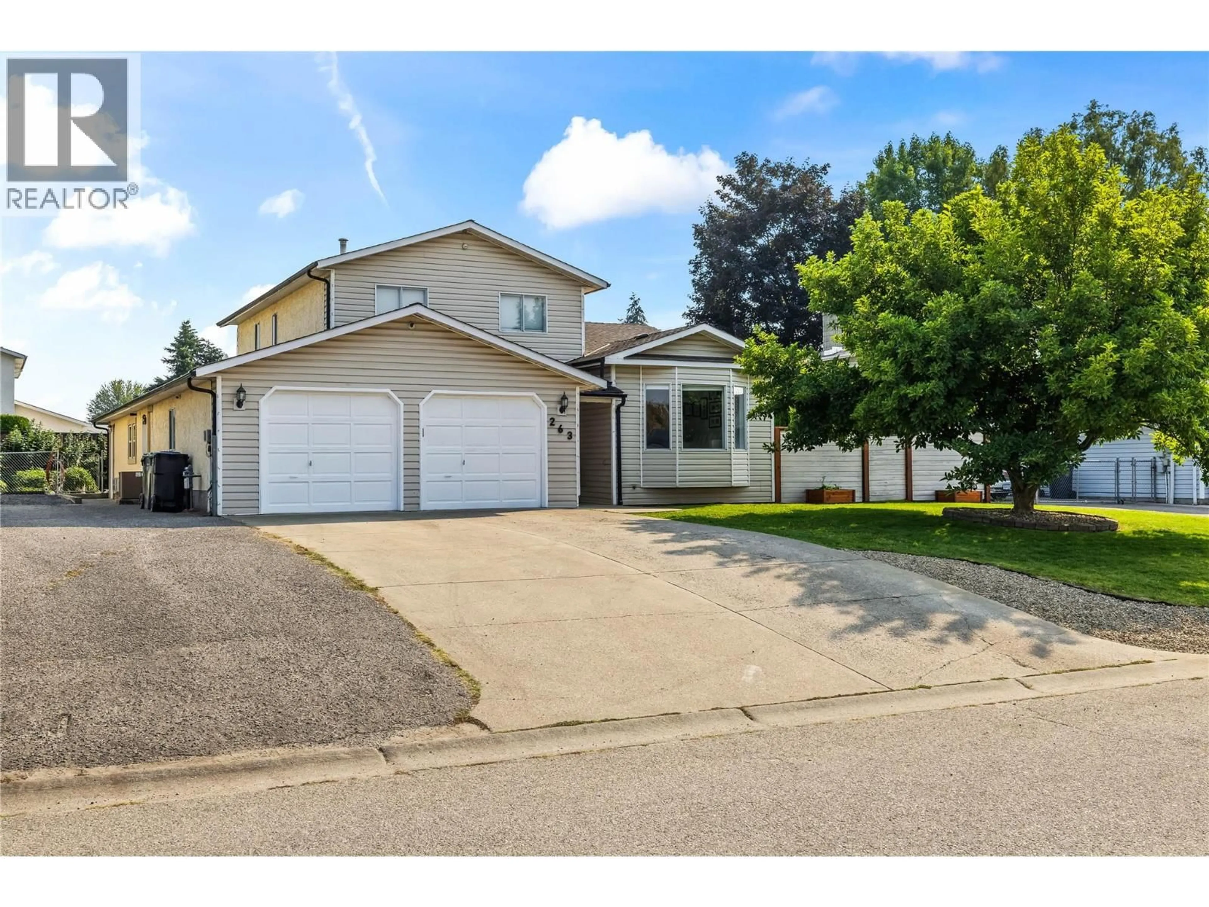 Home with vinyl exterior material, street for 263 DALGLEISH COURT, Kelowna British Columbia V1X7A4