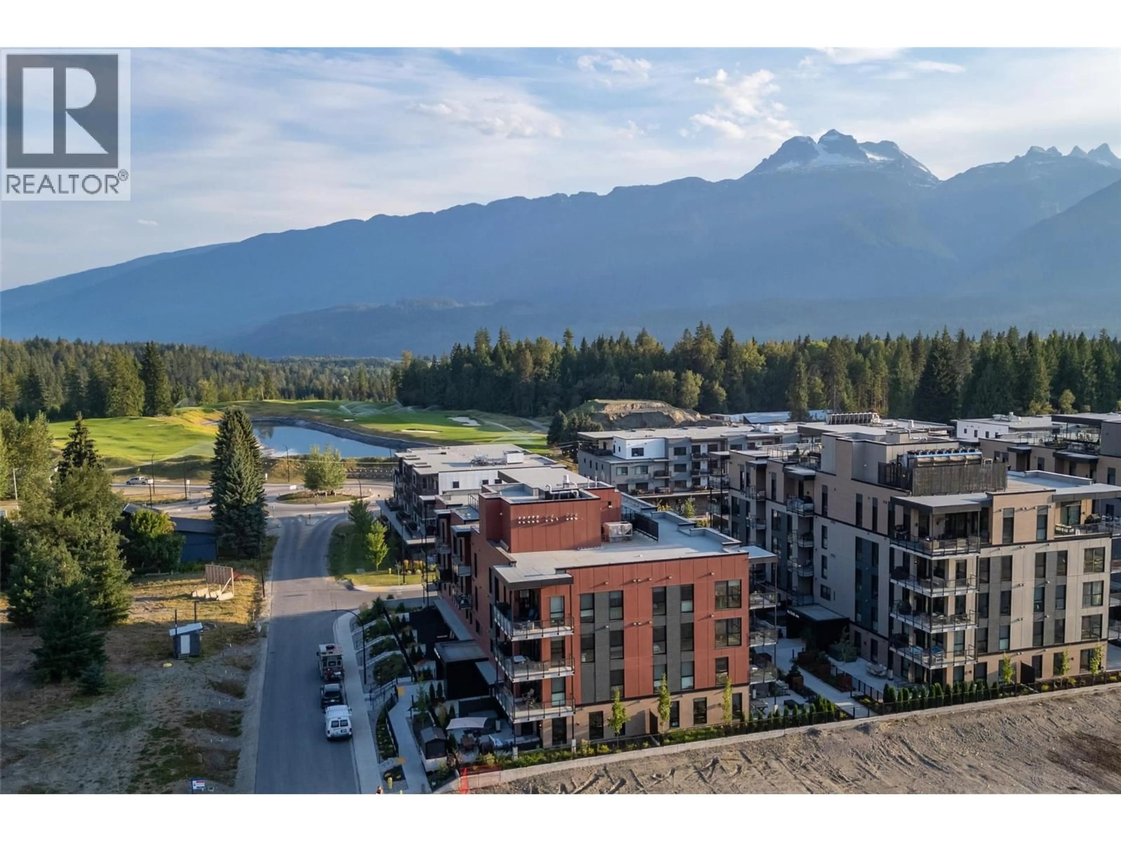 A pic from outside/outdoor area/front of a property/back of a property/a pic from drone, mountain view for 1301 - 1702 COURSIER AVENUE, Revelstoke British Columbia V0E2S3