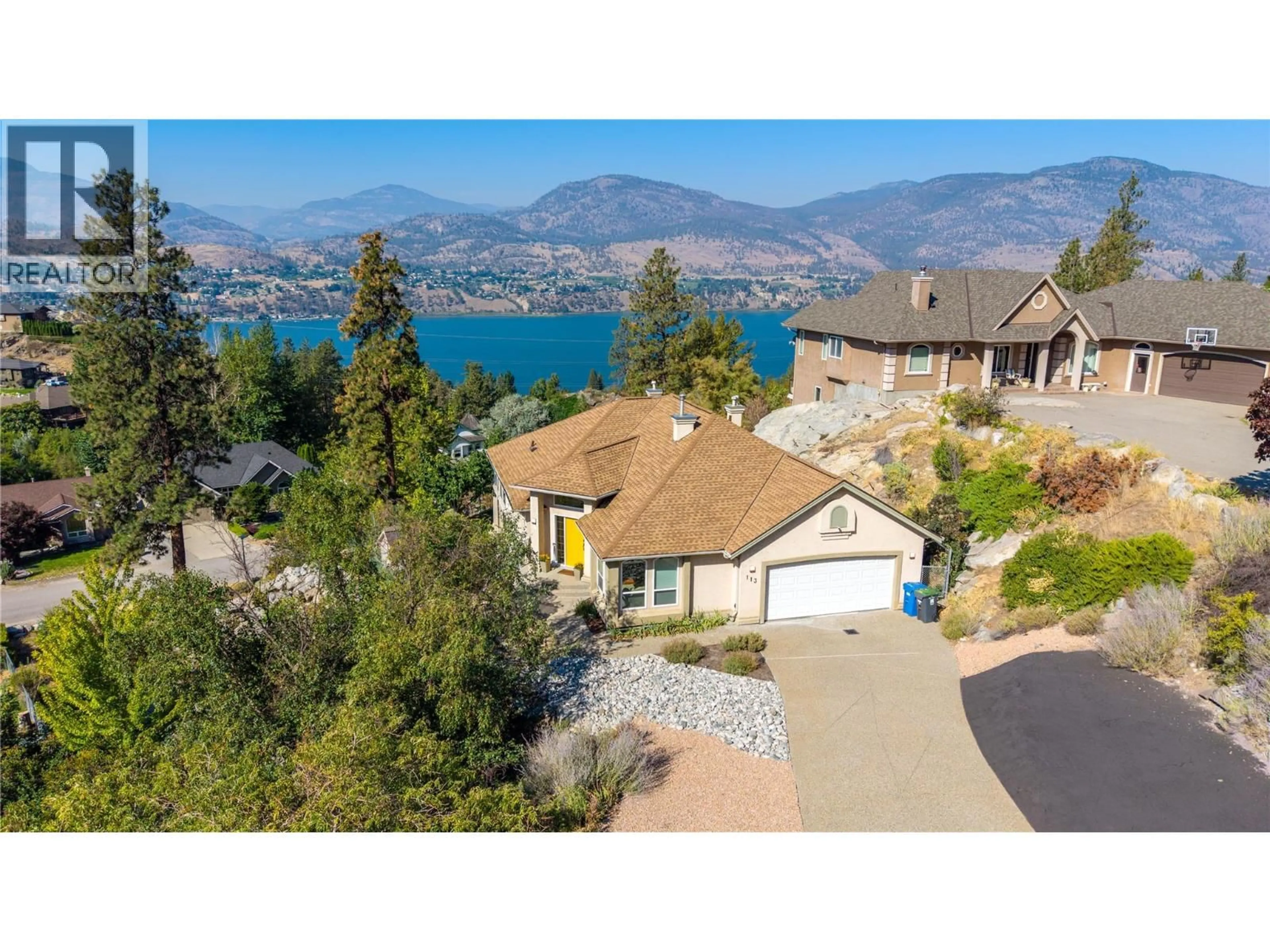 A pic from outside/outdoor area/front of a property/back of a property/a pic from drone, water/lake/river/ocean view for 113 CHRISTIE MOUNTAIN LANE, Okanagan Falls British Columbia V0H1R3