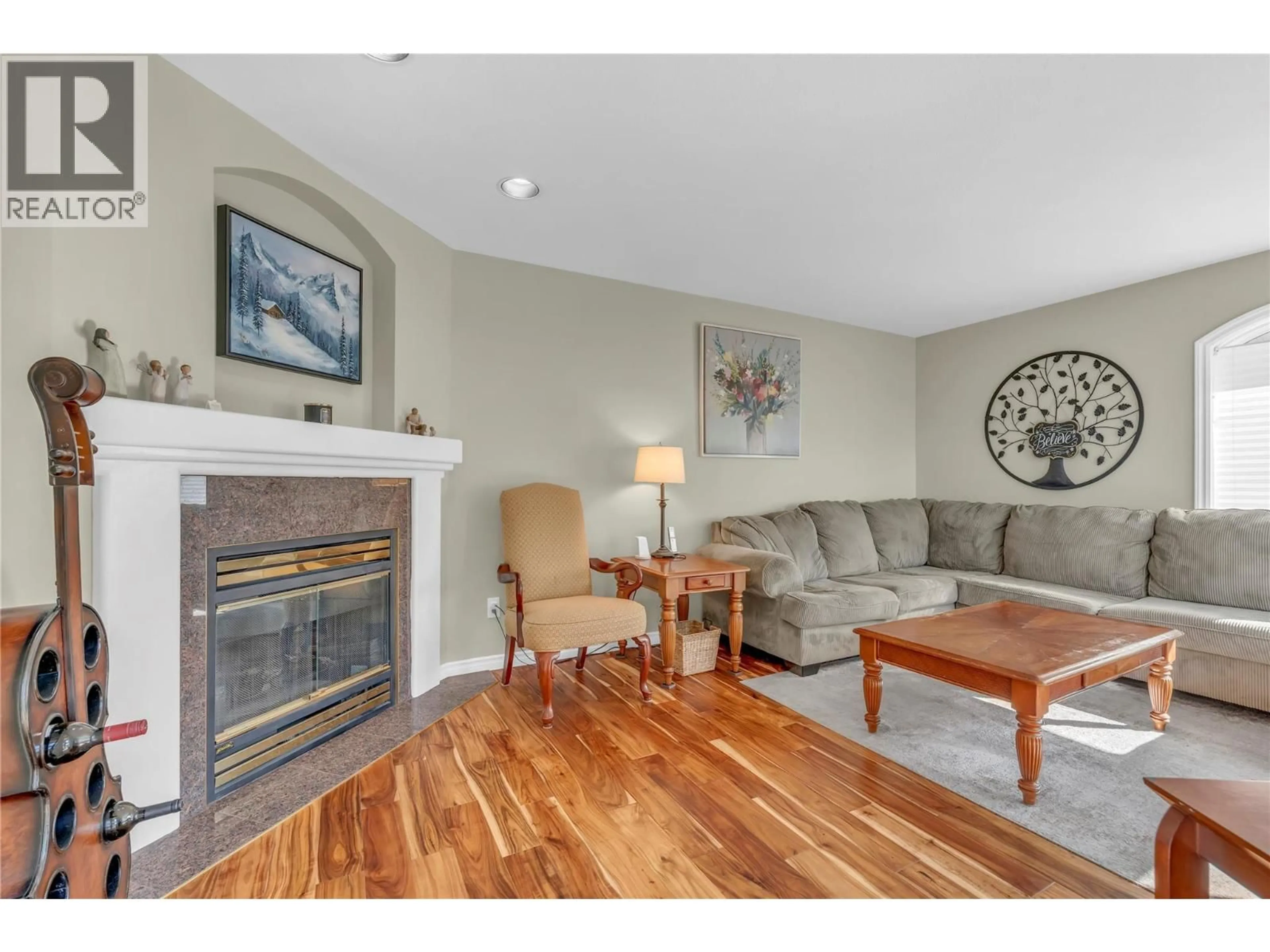 Living room with furniture, wood/laminate floor for 113 CHRISTIE MOUNTAIN LANE, Okanagan Falls British Columbia V0H1R3
