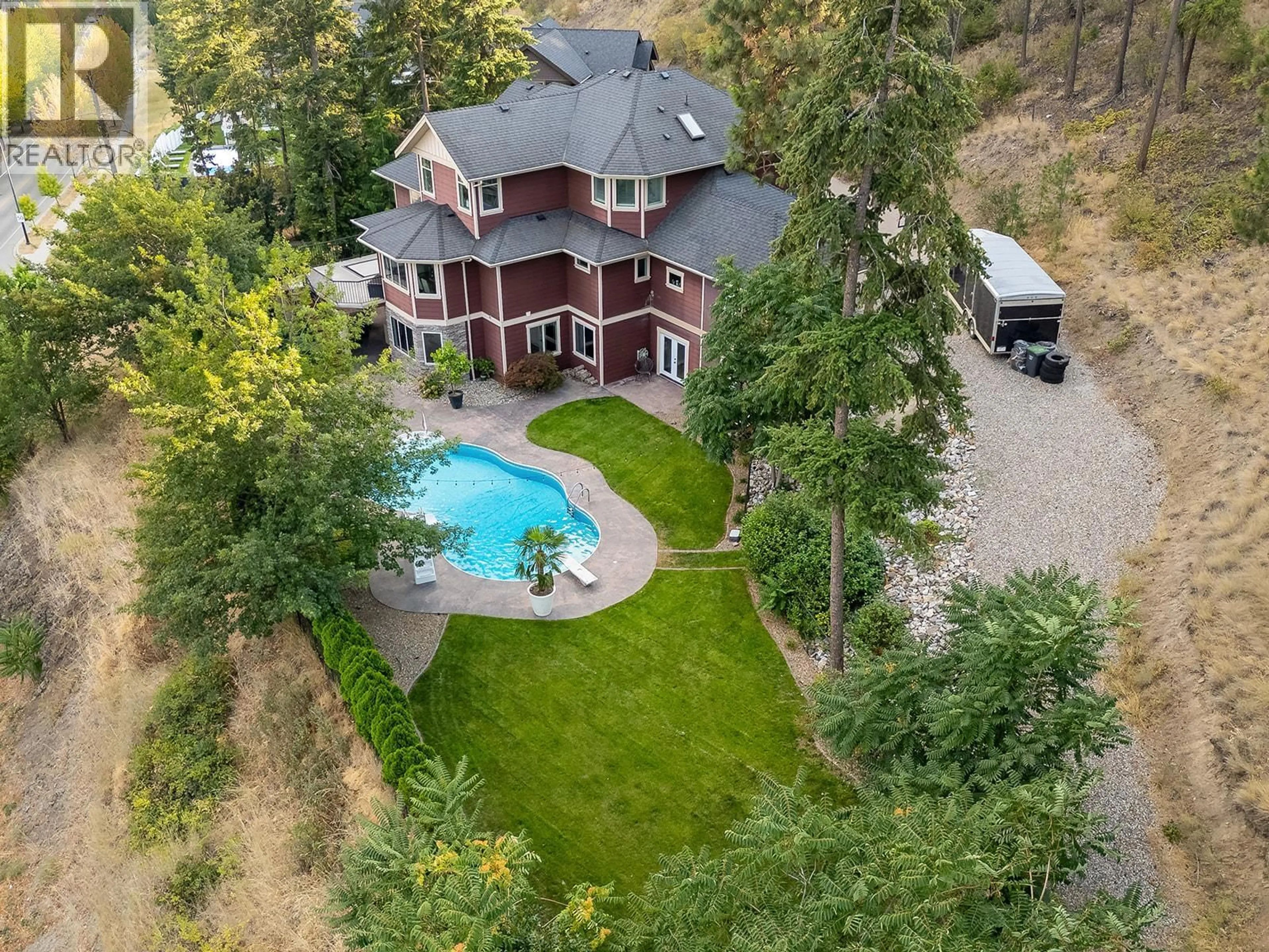 A pic from outside/outdoor area/front of a property/back of a property/a pic from drone, unknown for 421 TUCKER COURT, Kelowna British Columbia V1V2S9
