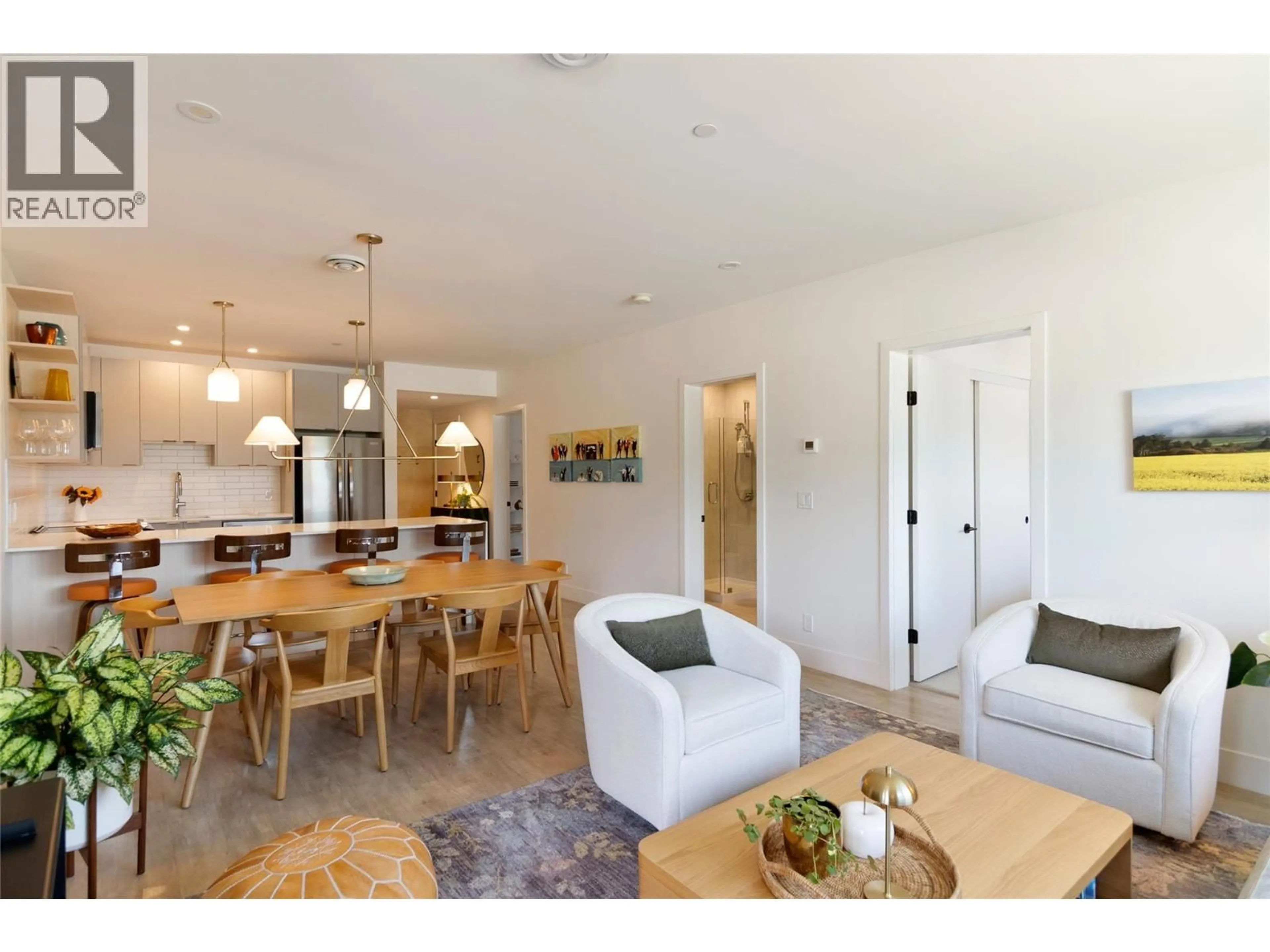 Open concept kitchen, wood/laminate floor for 3312 - 1701 COURSIER AVENUE, Revelstoke British Columbia V0E2S0