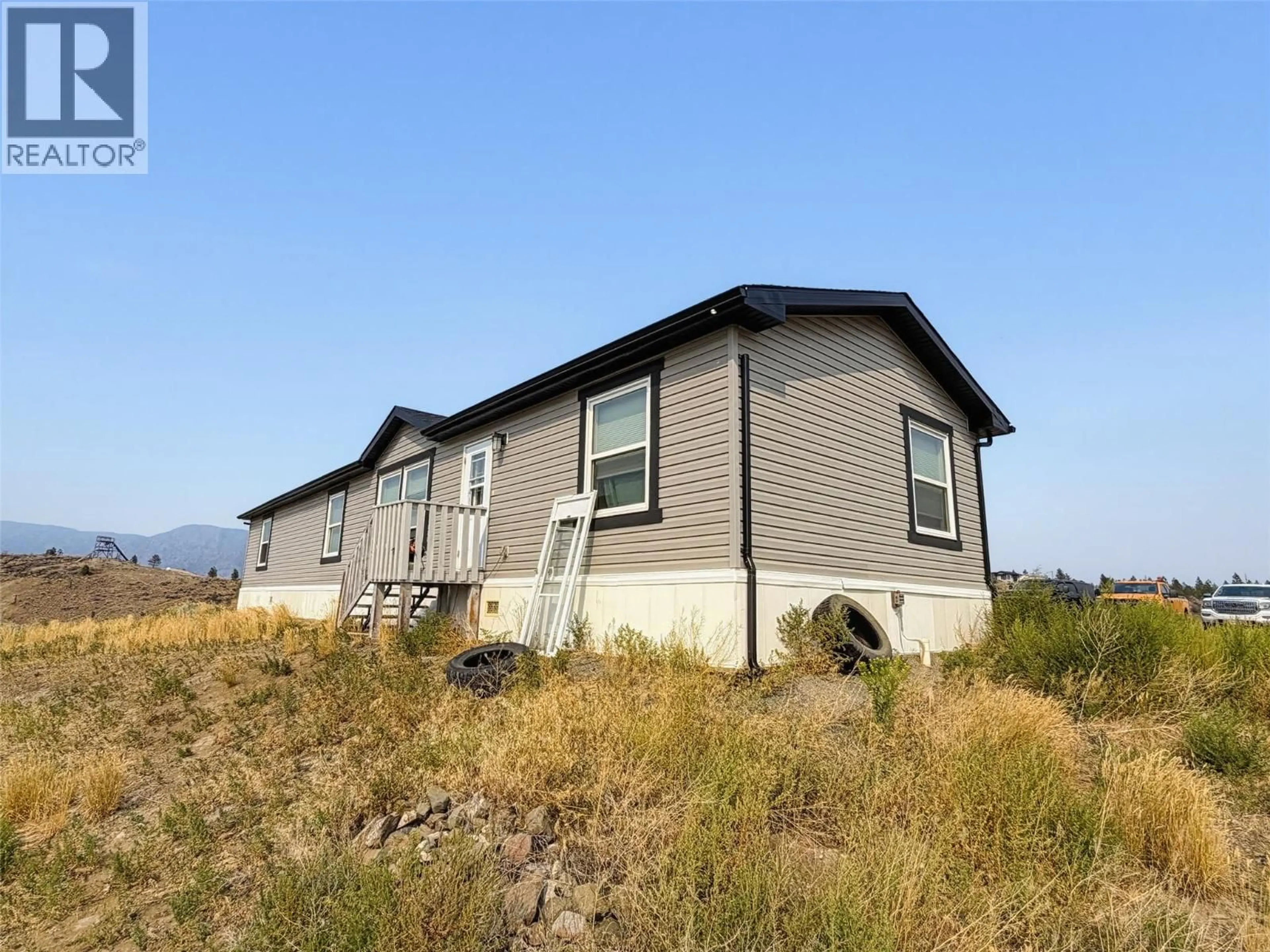 Home with vinyl exterior material, unknown for 620 DEER DRIVE, Kamloops British Columbia V1S1Z9