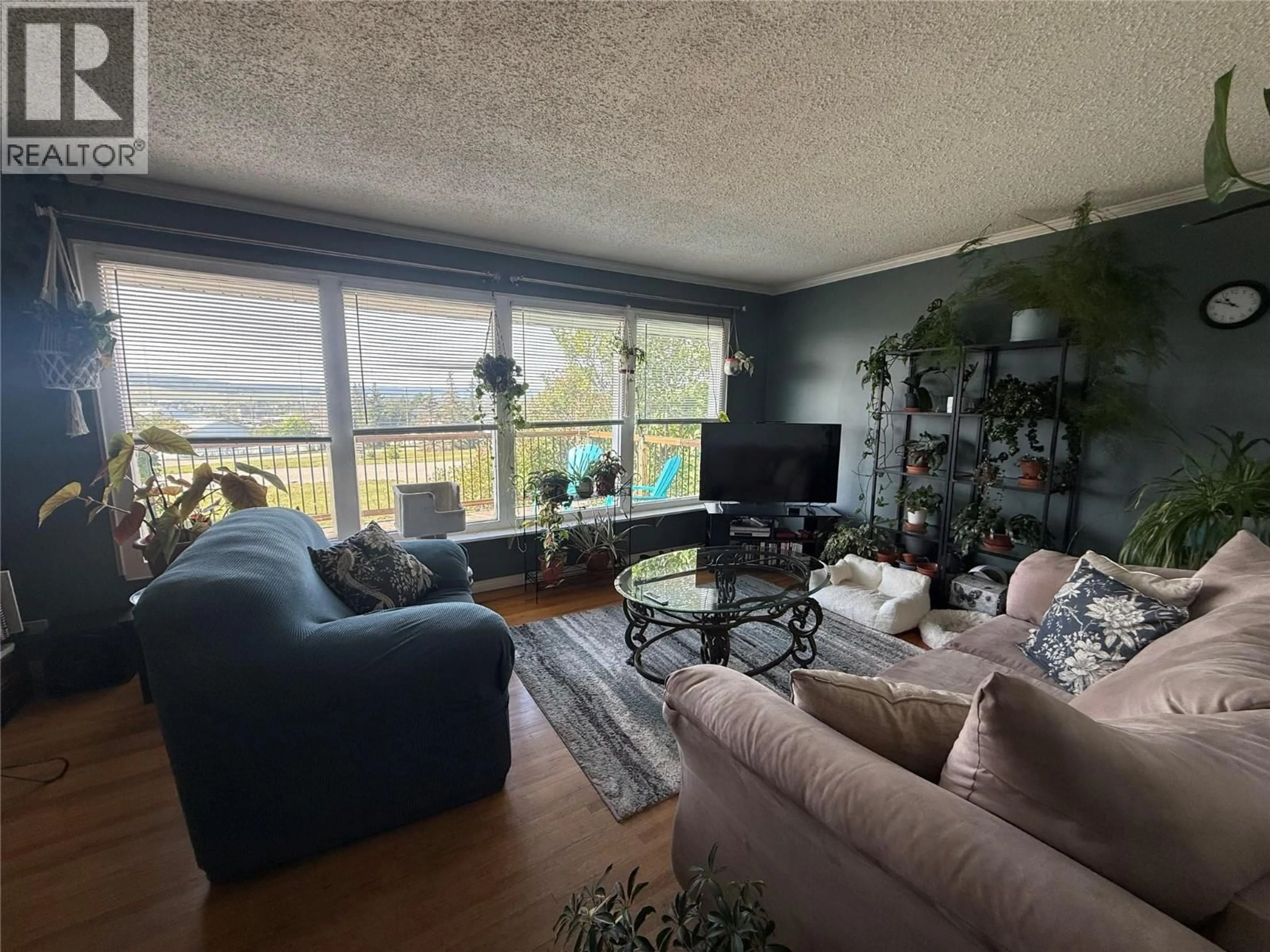 Living room with furniture, unknown for 904 CORNWALL CRESCENT, Dawson Creek British Columbia V1G1N9
