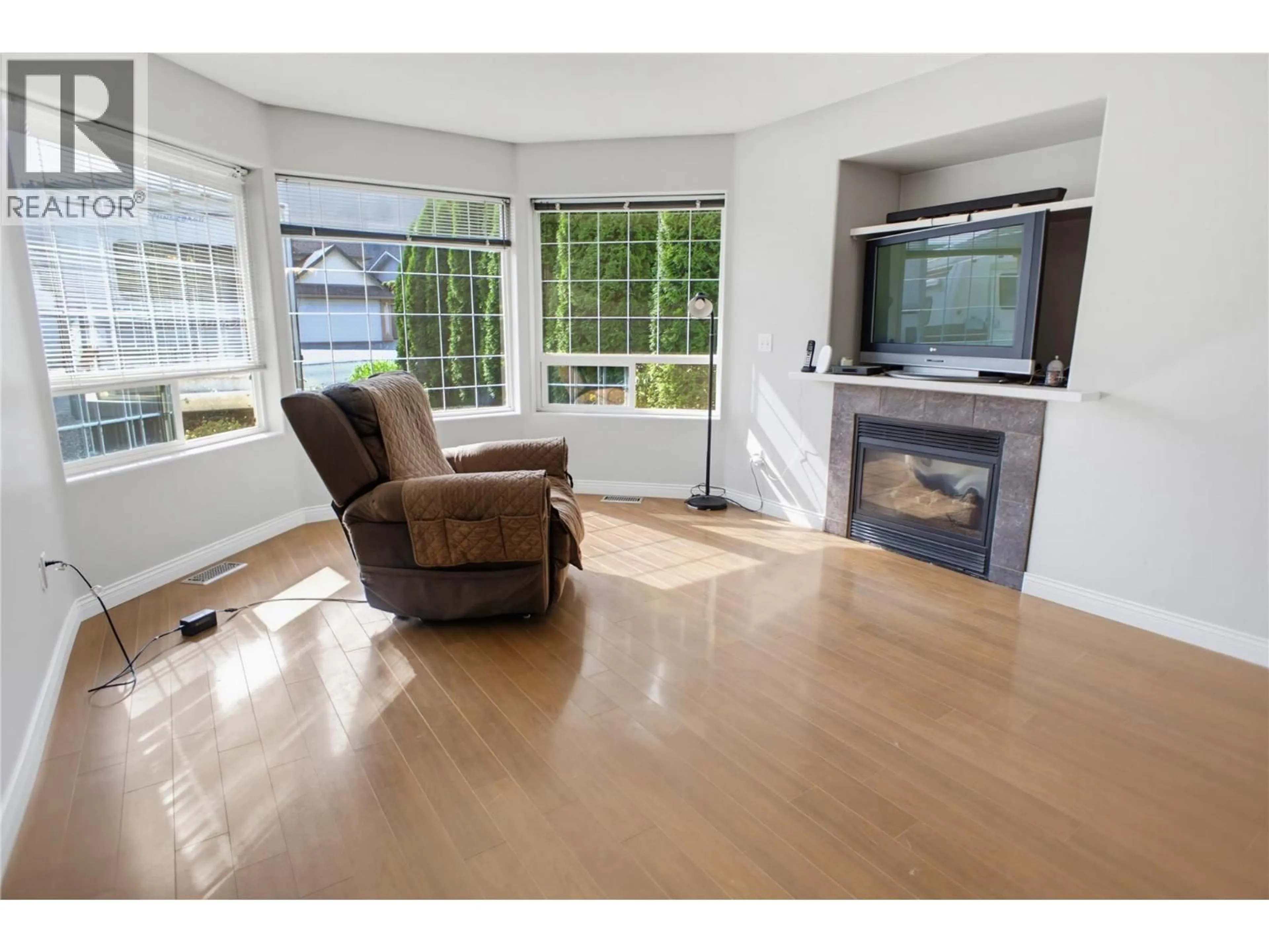 Living room with furniture, wood/laminate floor for 369 COYOTE DRIVE, Kamloops British Columbia V2C6T8