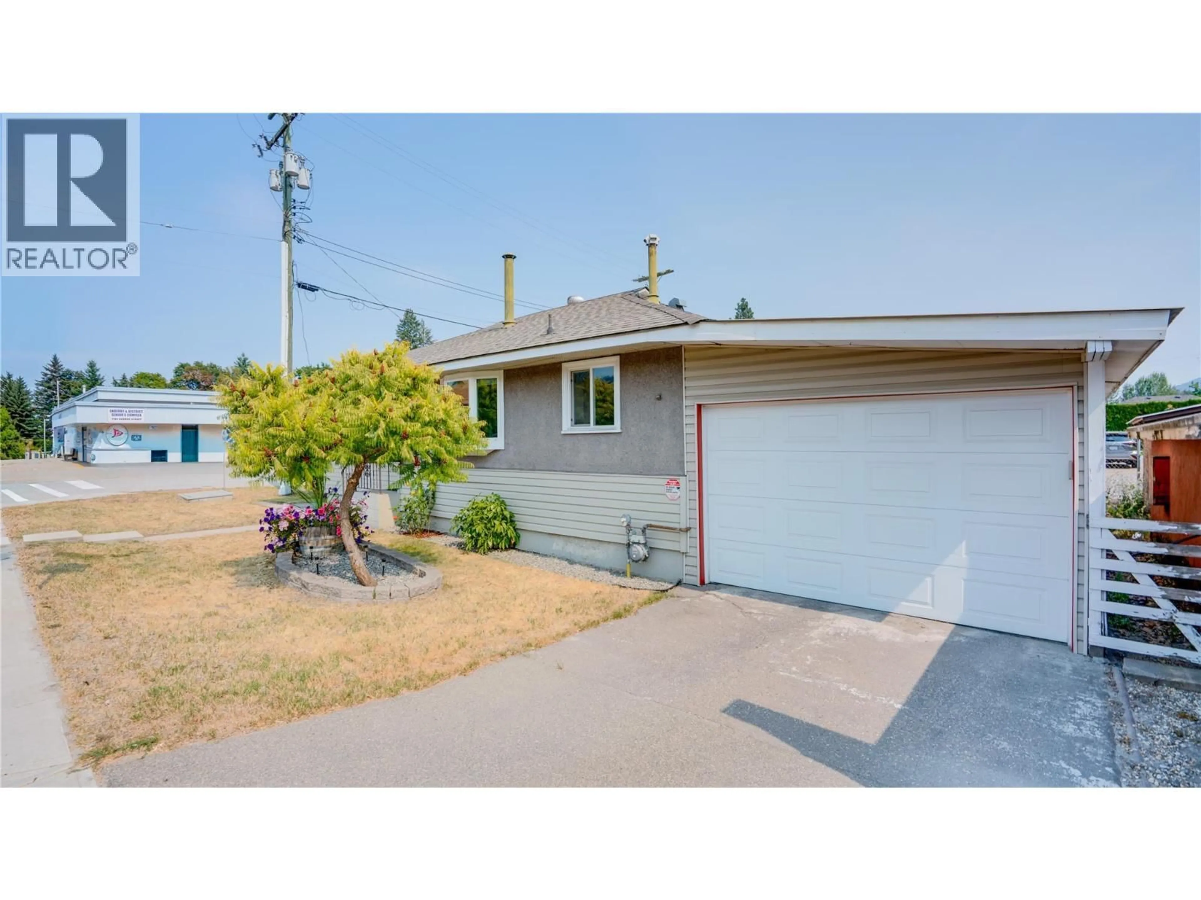 Home with vinyl exterior material, street for 1007 GEORGE STREET, Enderby British Columbia V0E1V0