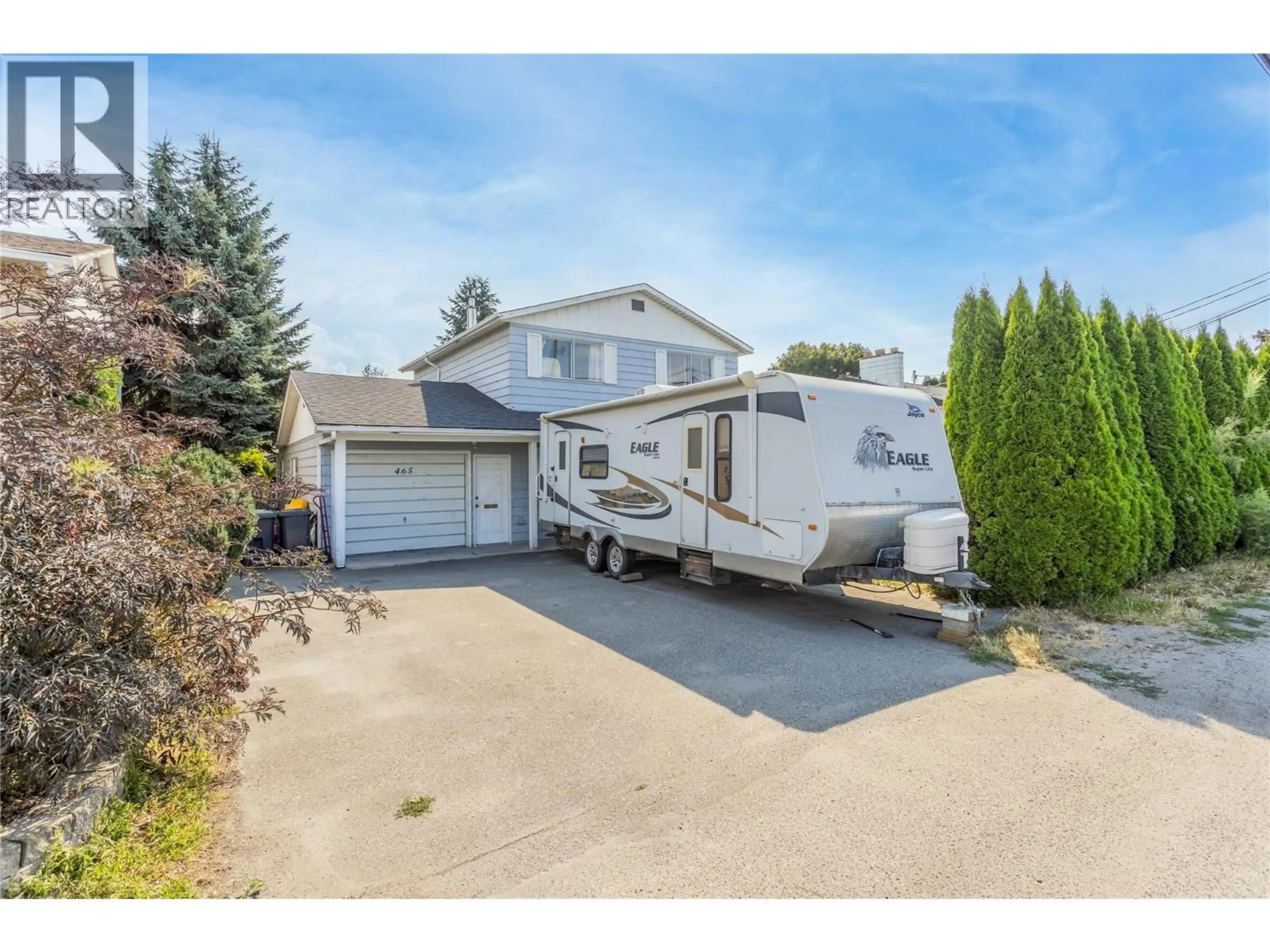 Home with vinyl exterior material, street for 465 BACH ROAD, Kelowna British Columbia V1X2K8