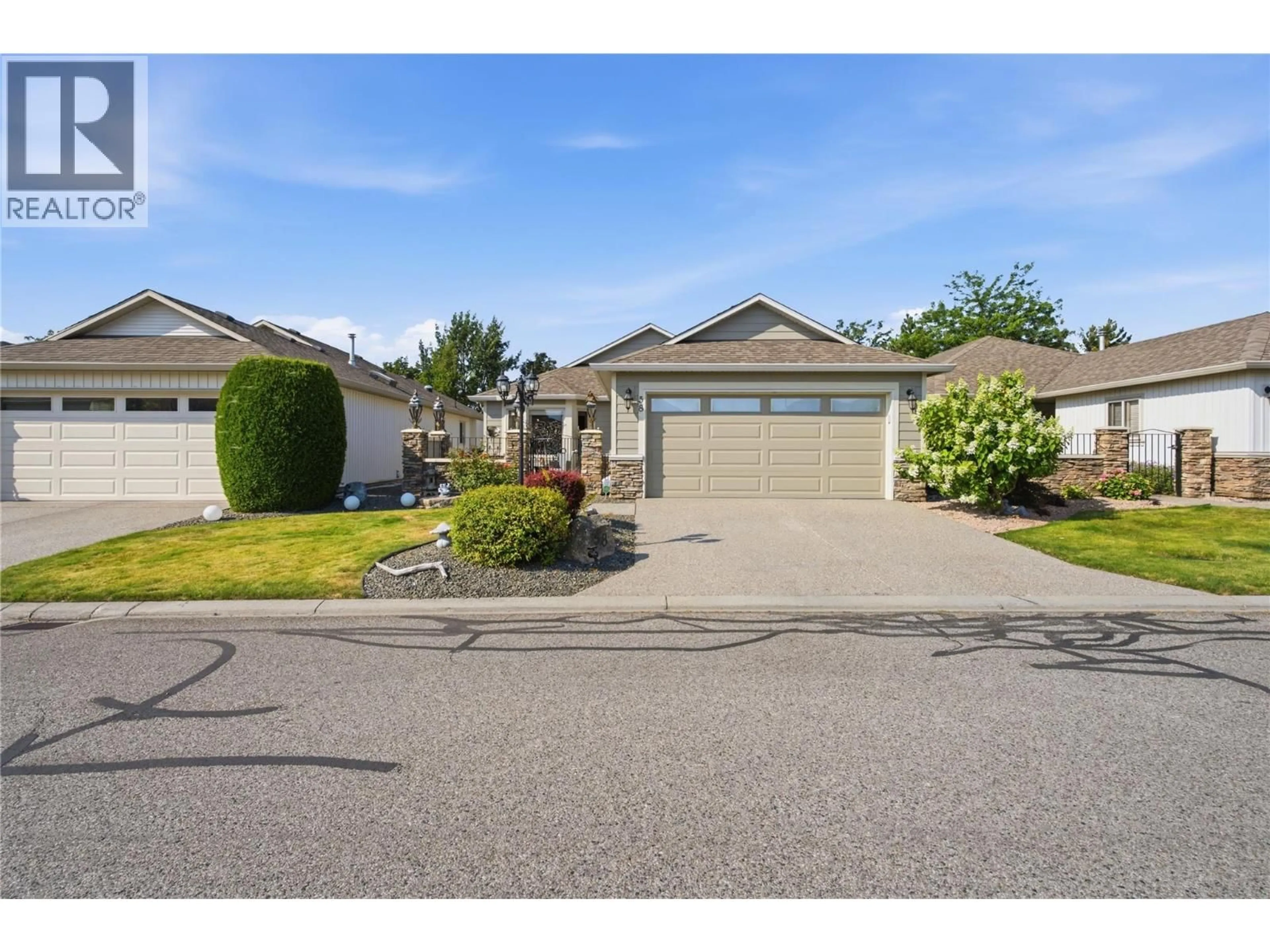 A pic from outside/outdoor area/front of a property/back of a property/a pic from drone, street for 58 - 2365 STILLINGFLEET ROAD, Kelowna British Columbia V1W4X5