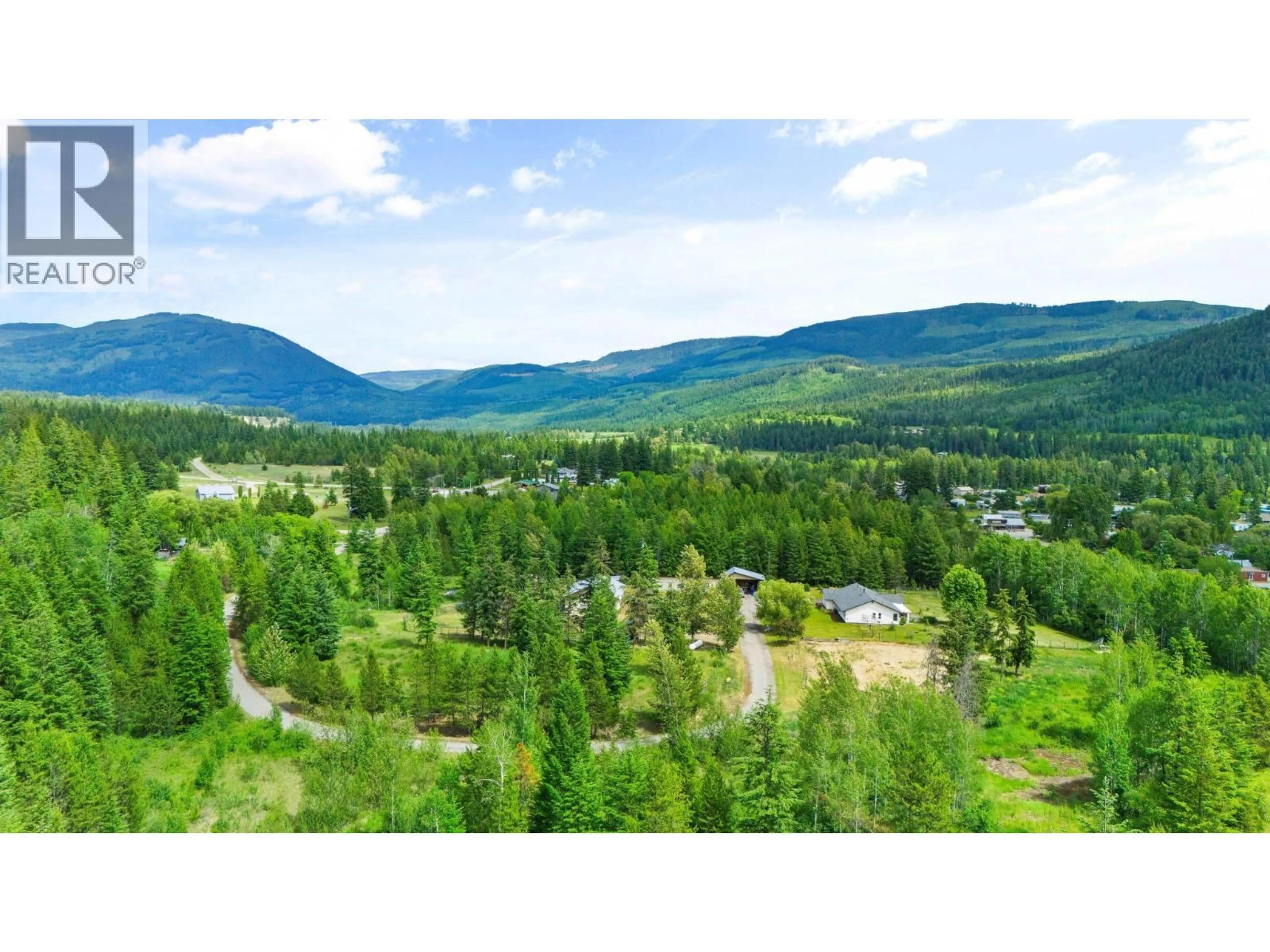 A pic from outside/outdoor area/front of a property/back of a property/a pic from drone, mountain view for 3056 HARMON ROAD, Vavenby British Columbia V0E3A0