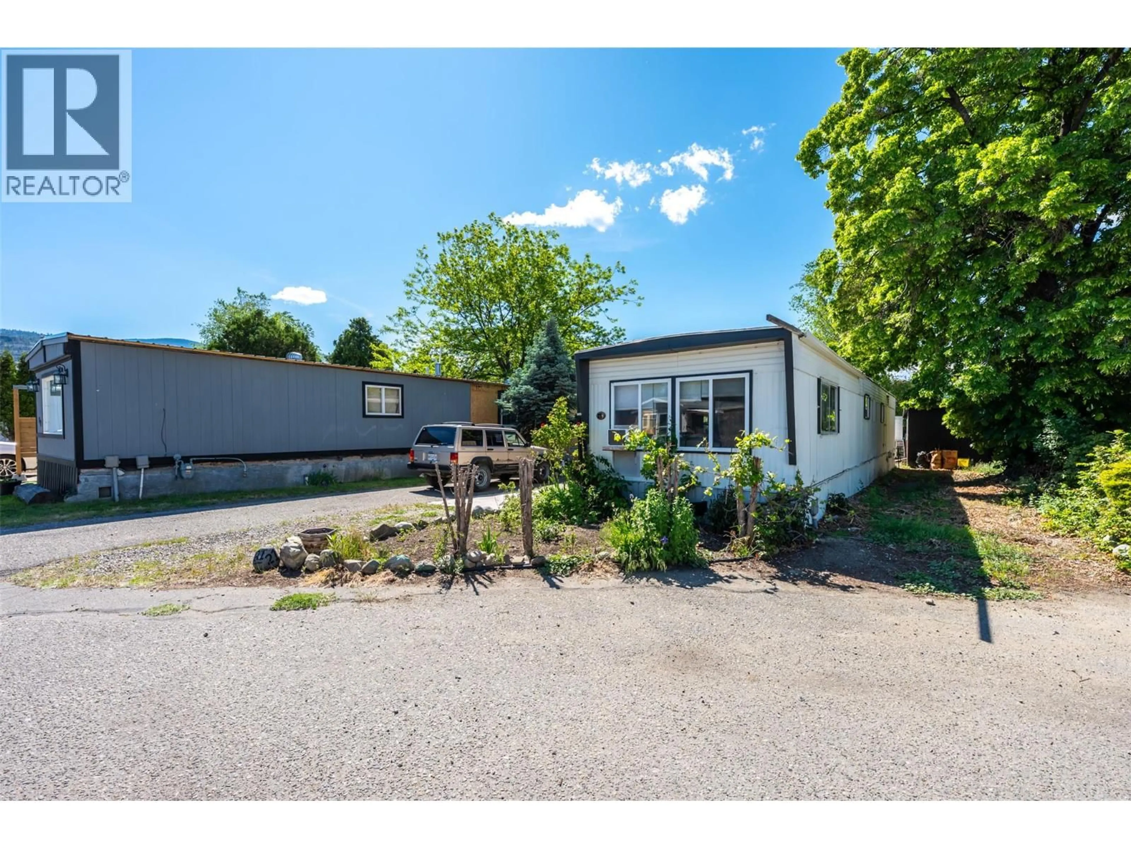 A pic from outside/outdoor area/front of a property/back of a property/a pic from drone, unknown for 21 - 3999 SKAHA LAKE ROAD, Penticton British Columbia V2A6J7